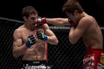 Dong Hyun Kim (right) knocked out John Hathaway at UFC Fight Night 37.