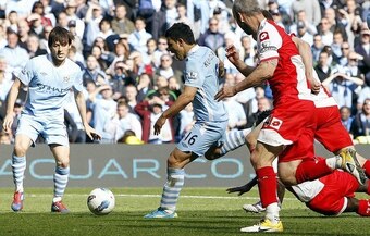 It is hard to believe Aguero could score that goal in those socks.