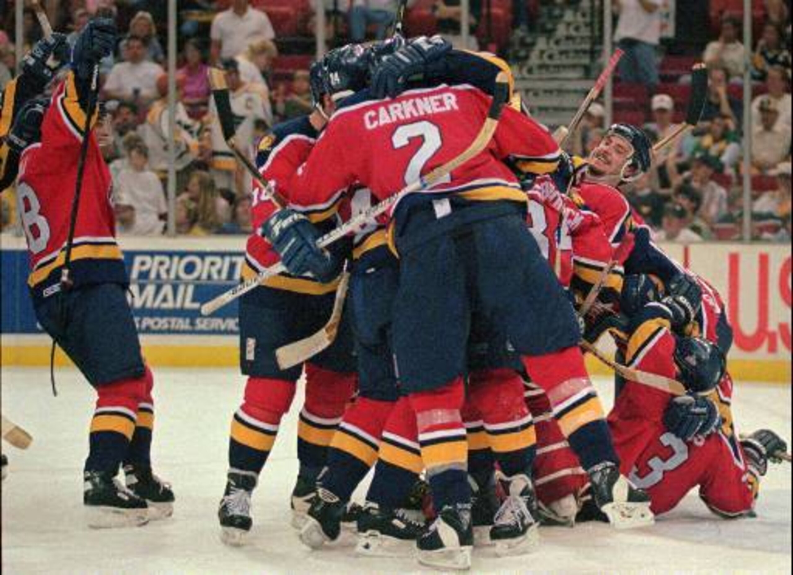 Florida Panthers players celebrate their 3-1 victory over the Pittsburgh Penguins in game 7 of their Eastern Conference playoff series, in Pittsburgh, Saturday June 1, 1996. The Panthers will face the Colorado Avalanche in the Stanley Cup finals. (AP Phot