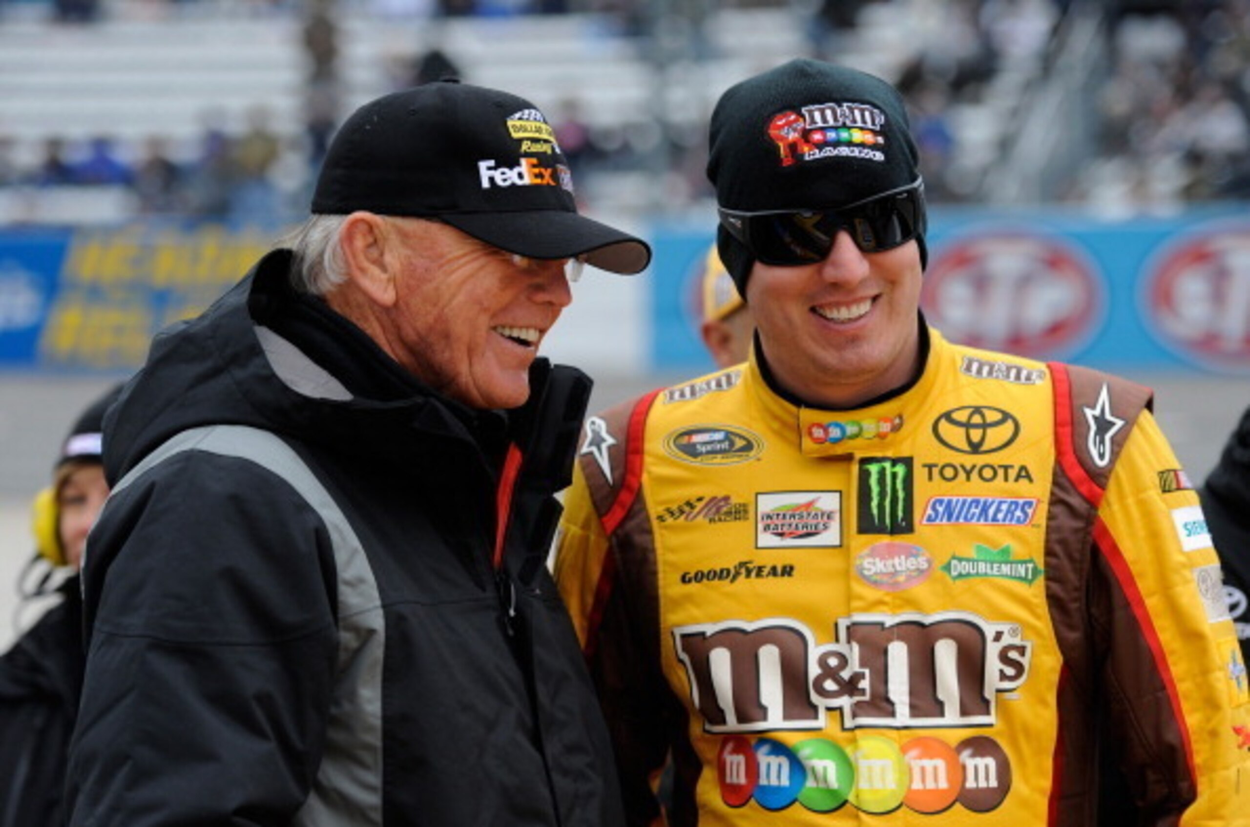 Kyle Busch (right), shown here with team owner Joe Gibbs, has won once and is poised to win again.