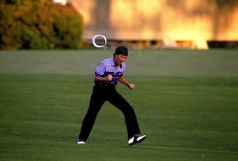 Larry Mize reacts to his chip-in on the second playoff hole in 1987.