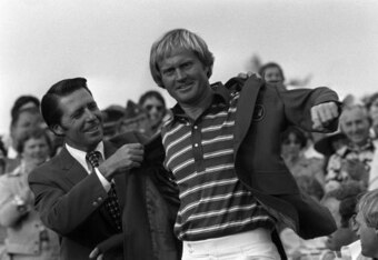 Jack Nicklaus accepts his fifth green jacket from Gary Player.