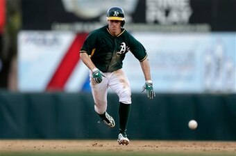 And he's off! Burns takes off during a spring training game.
