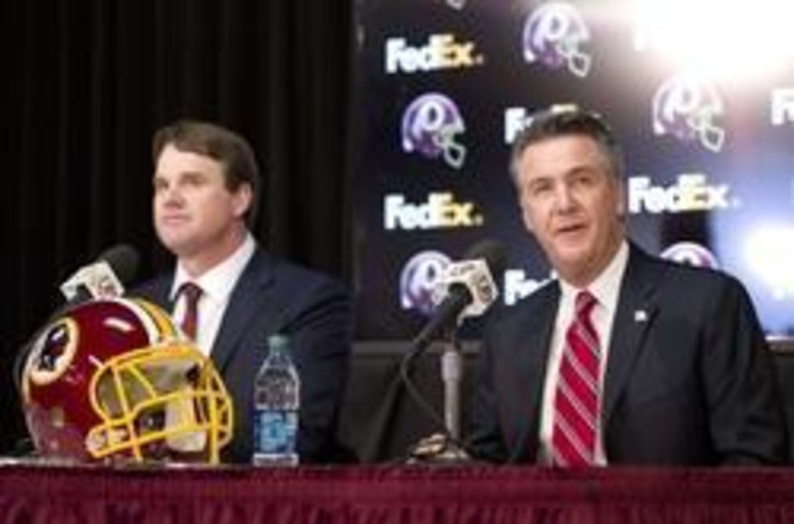 Head coach Jay Gruden (left) and general manager Bruce Allen (right) may be enticed to trade for the 49ers' first-round pick in 2014.