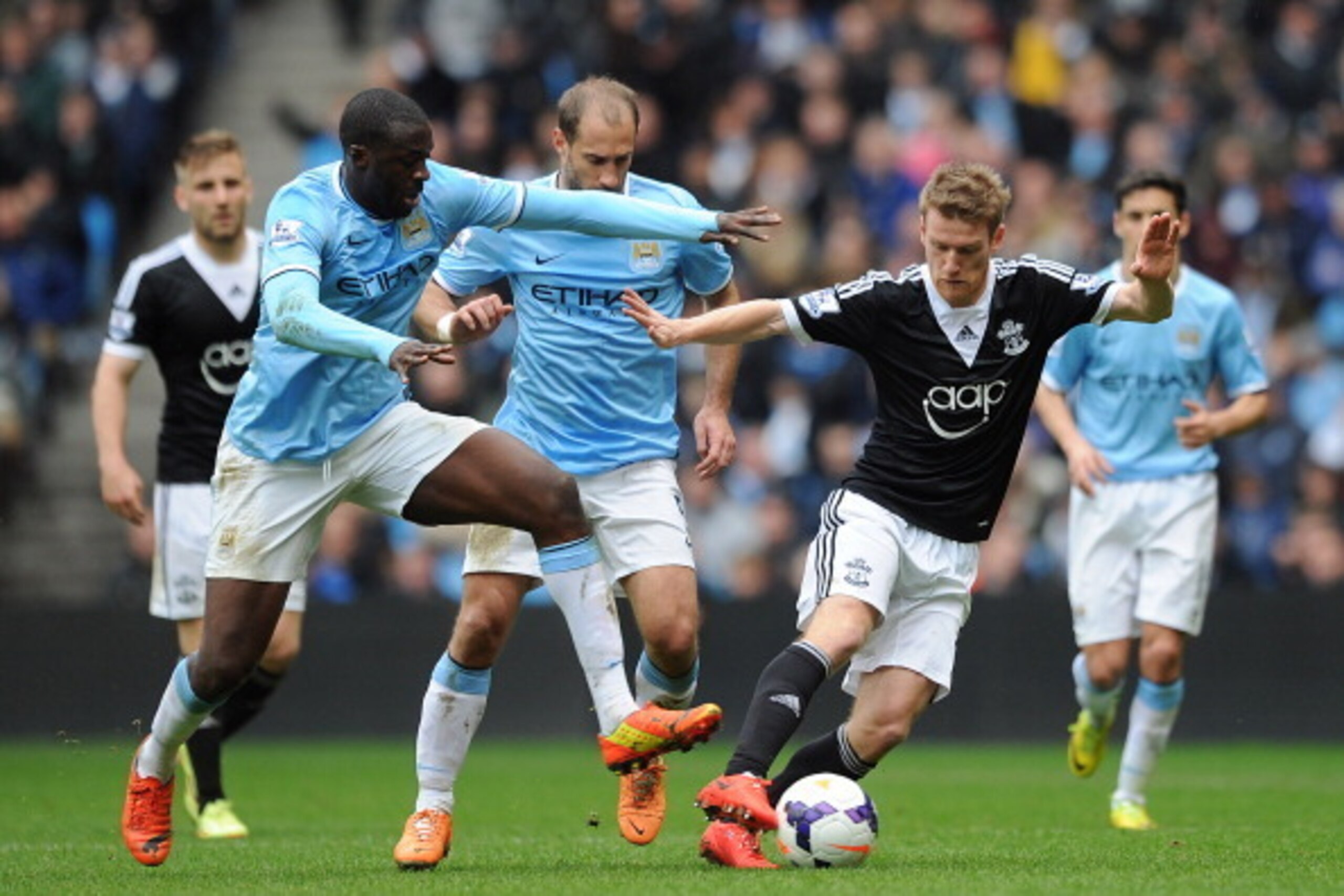 Steven Davis of Southampton under pressure from Manchester City's Yaya Toure and Pablo Zabaleta in their Premier League tie. Steven Davis of Southampton under pressure from Manchester City's Yaya Toure and Pablo Zabaleta in their Premier League tie.