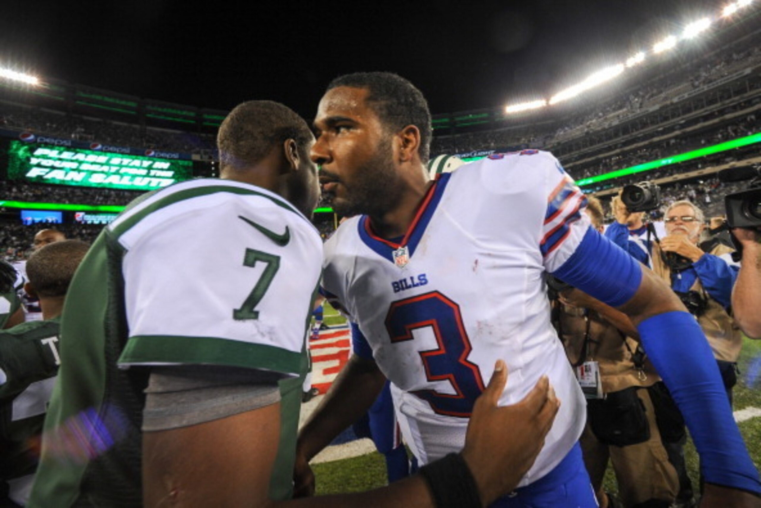 Geno Smith (left) and EJ Manuel (right) are in the beginning stages of a potential careerlong rivalry.