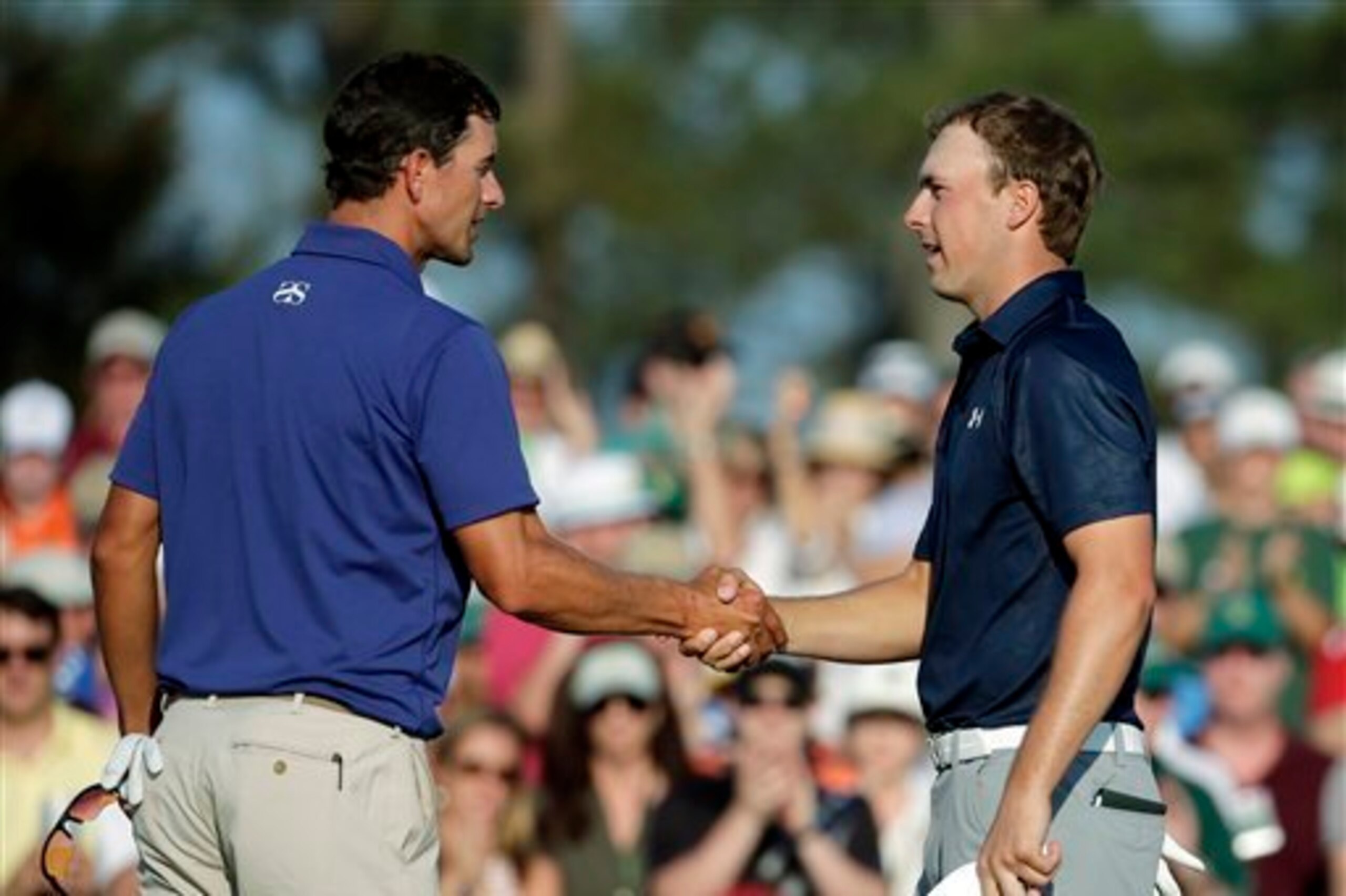 Adam Scott (left) soared while Jordan Spieth soared on moving day at the Masters.