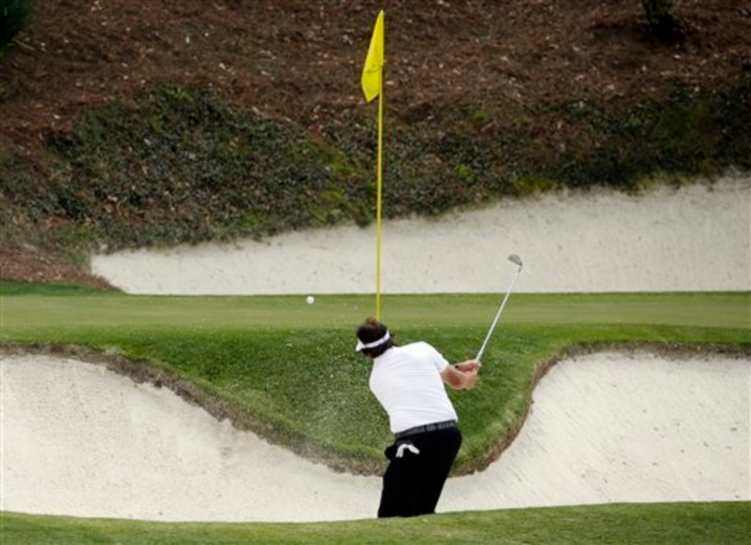 Part of Phil Mickelson's undoing was his going from bunker-to-bunker-to-bunker on No. 12