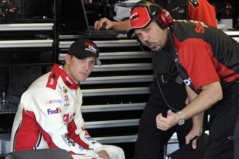 Denny Hamlin (left, with crew chief Darian Grubb) very well could make a big move in the very next race, and needs to.