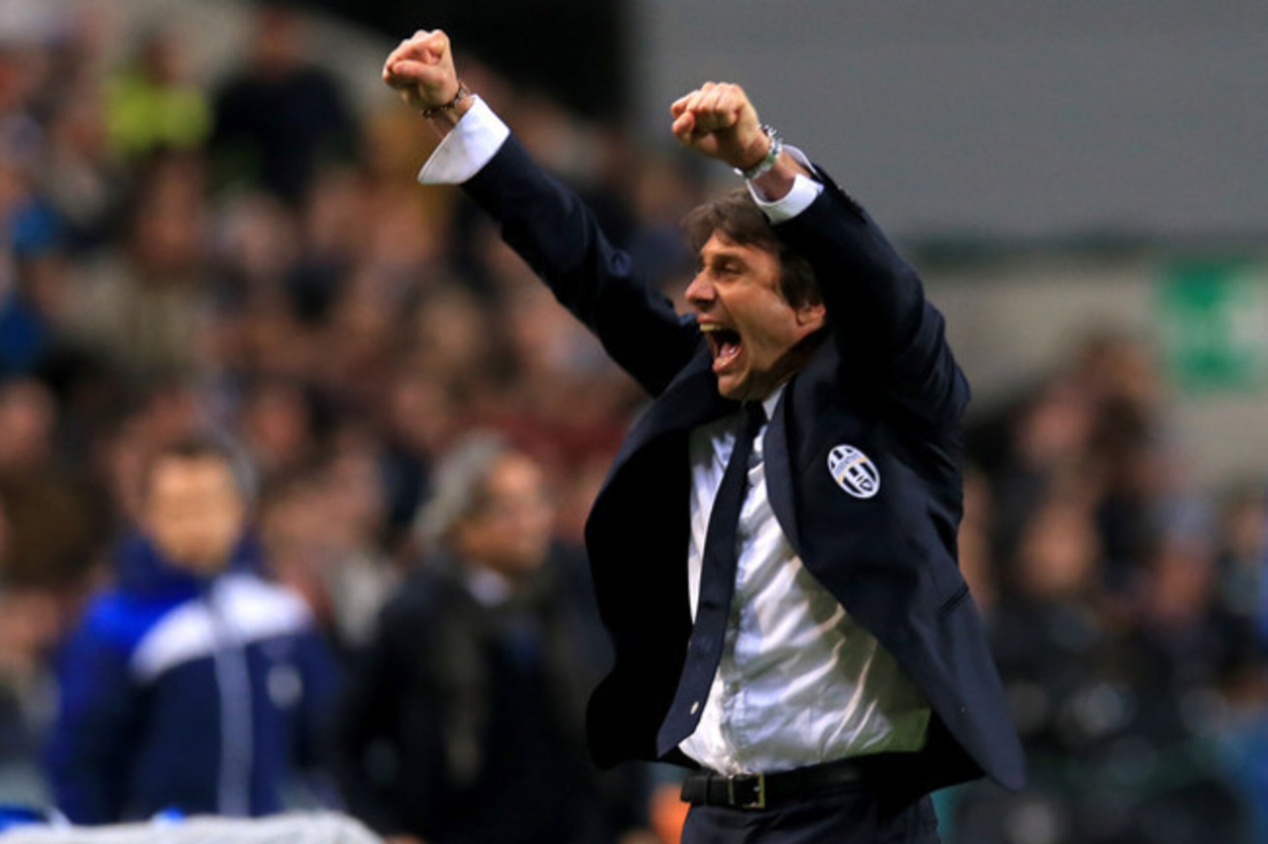 Antonio Conte celebrates a potential scudetto clincher against Udinese on Monday.