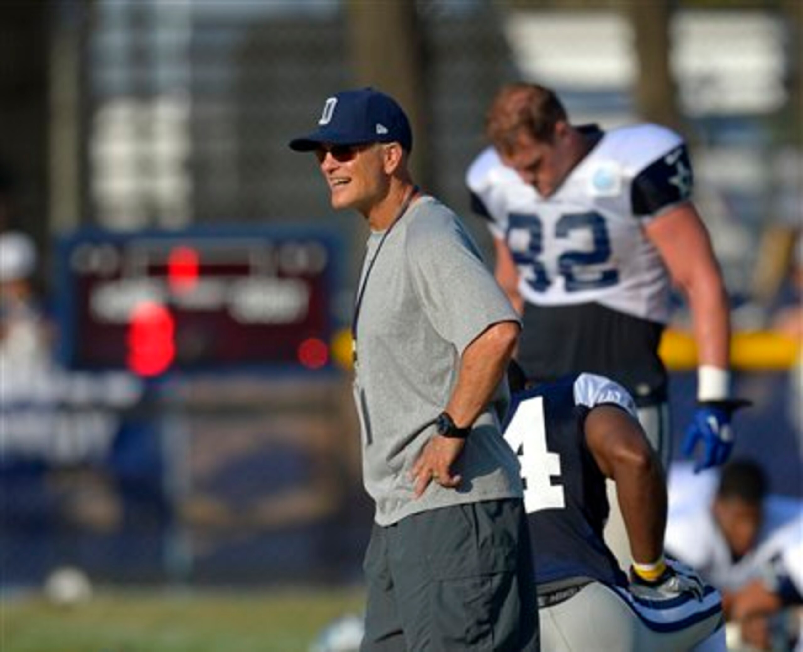 New defensive coordinator Rod Marinelli (above, gray shirt) will look to turn around a defense that gave up the third-most yards in NFL history in 2013.