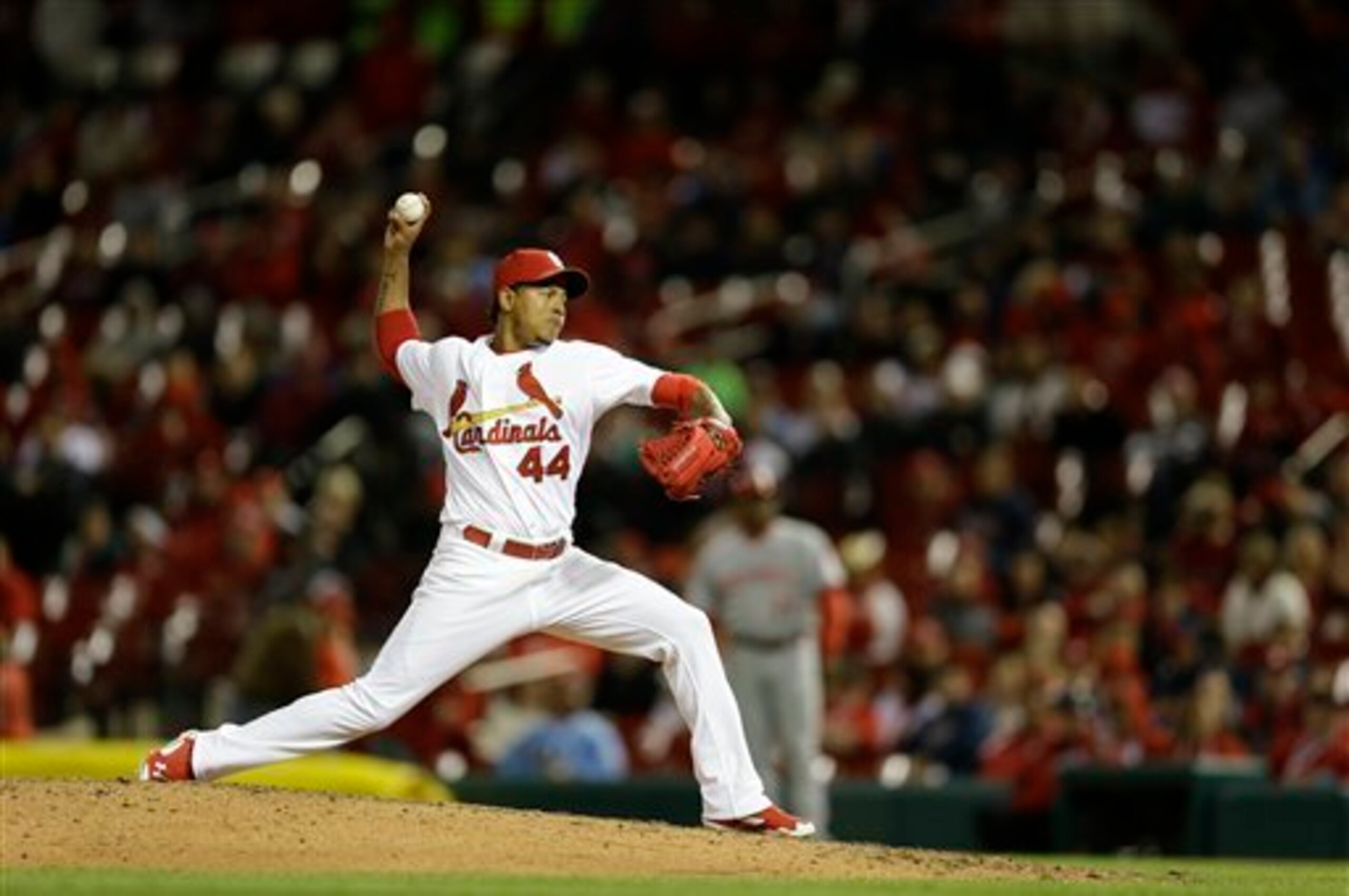 Carlos Martinez throws a pitch against the Reds on April 8.