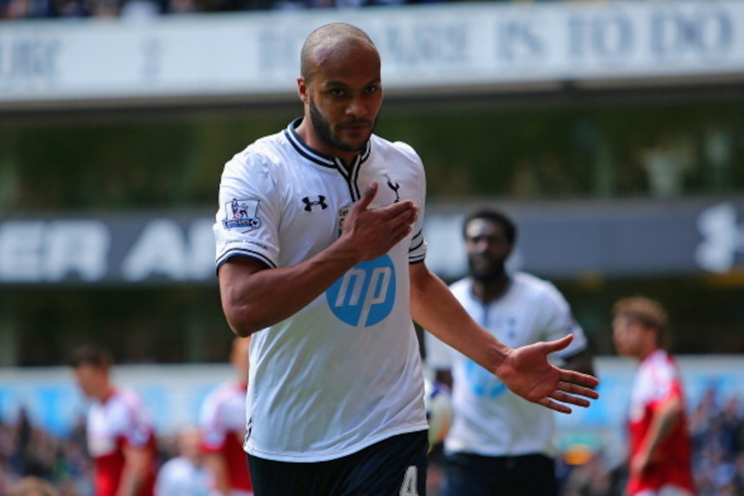 Younes Kaboul celebrates putting his Tottenham Hotspur team 3-1 up against Fulham. Younes Kaboul celebrates putting his Tottenham Hotspur team 3-1 up against Fulham.