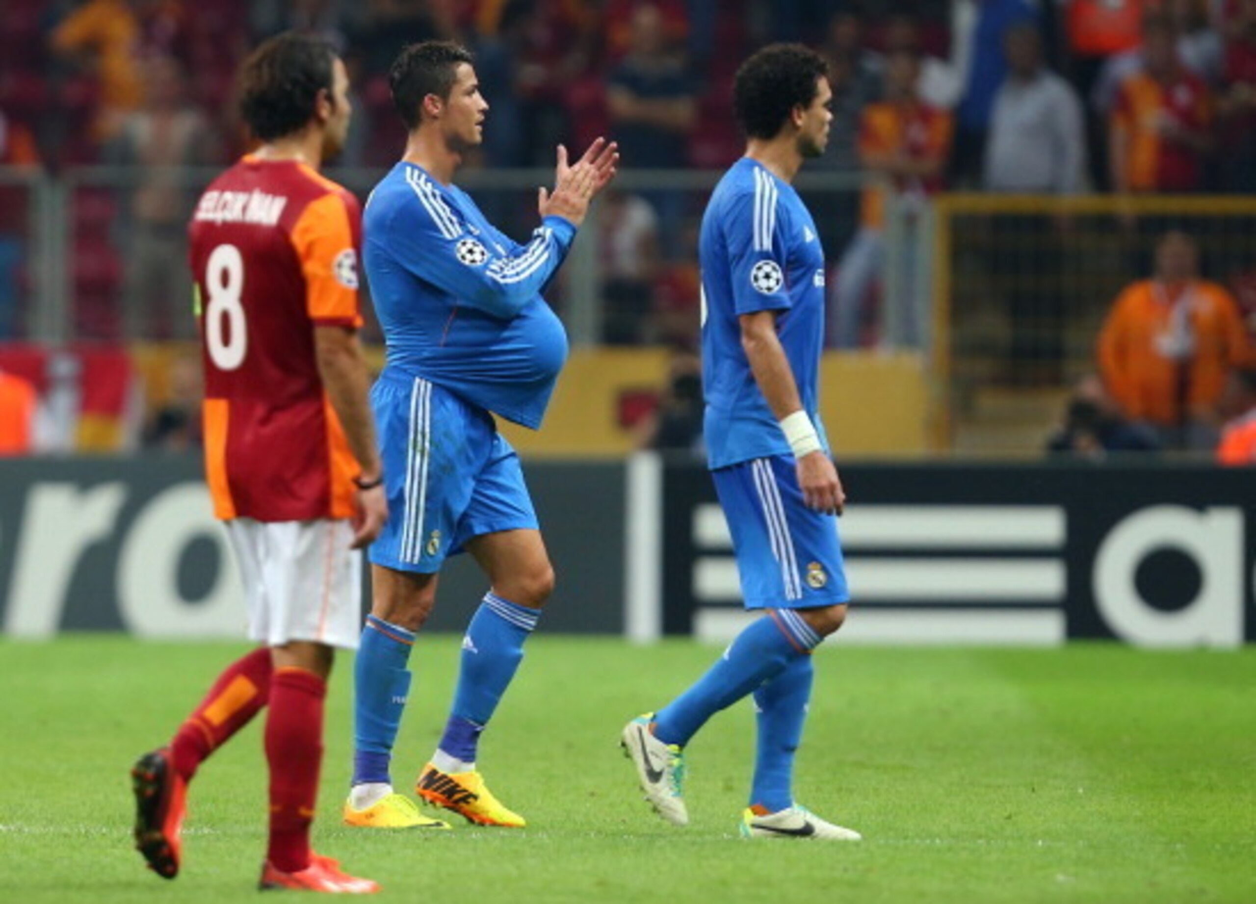 Ronaldo tucked the match ball under his shirt.