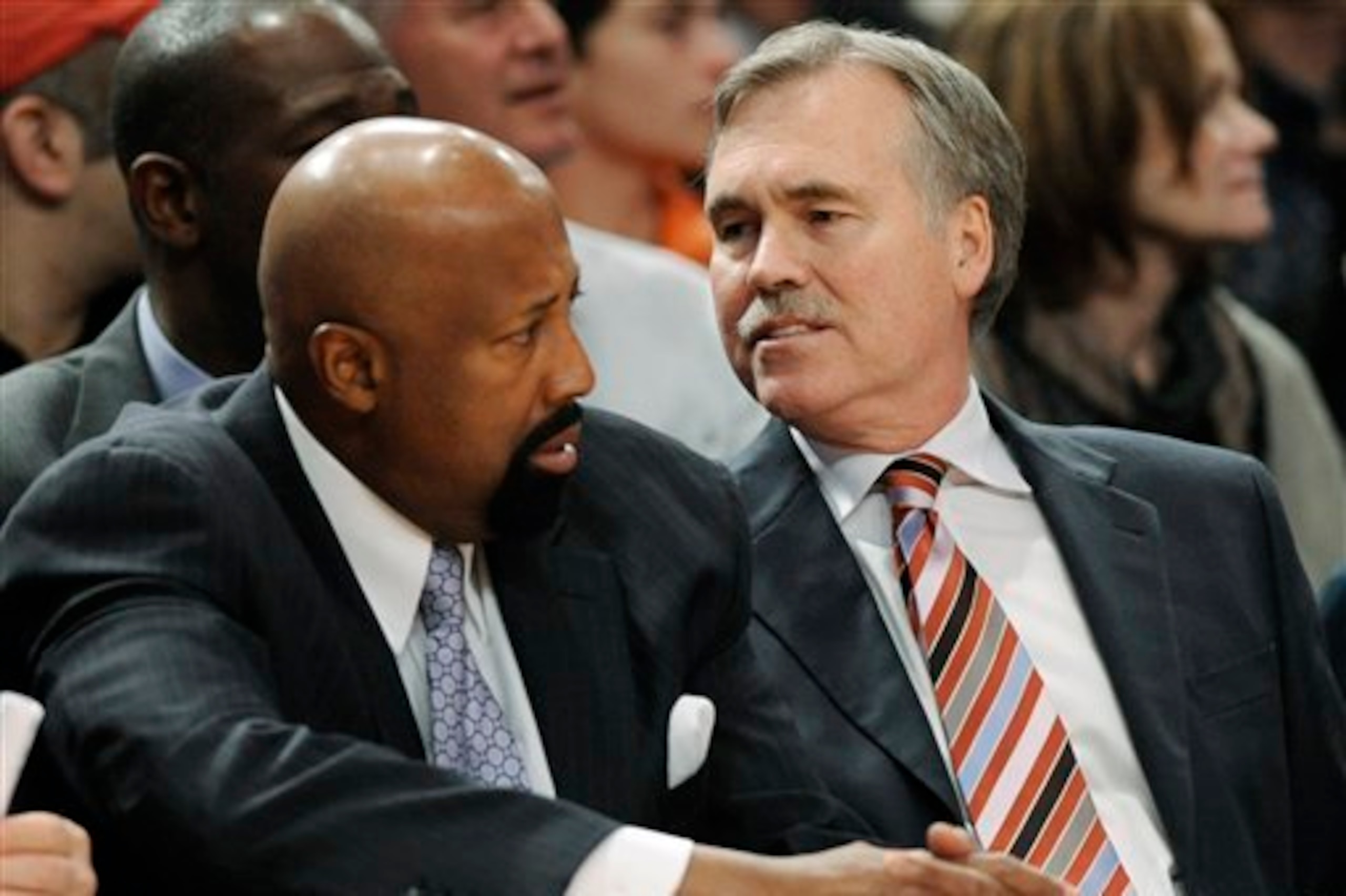 Mike Woodson (left) has already been canned; is Mike D'Antoni (right) the next to go? Mike Woodson (left) has already been canned; is Mike D'Antoni (right) the next to go?