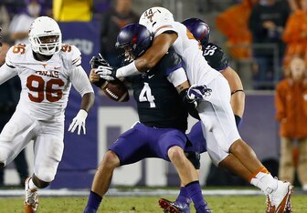 Texas DE Jackson Jeffcoat (right) comes from a football bloodline.