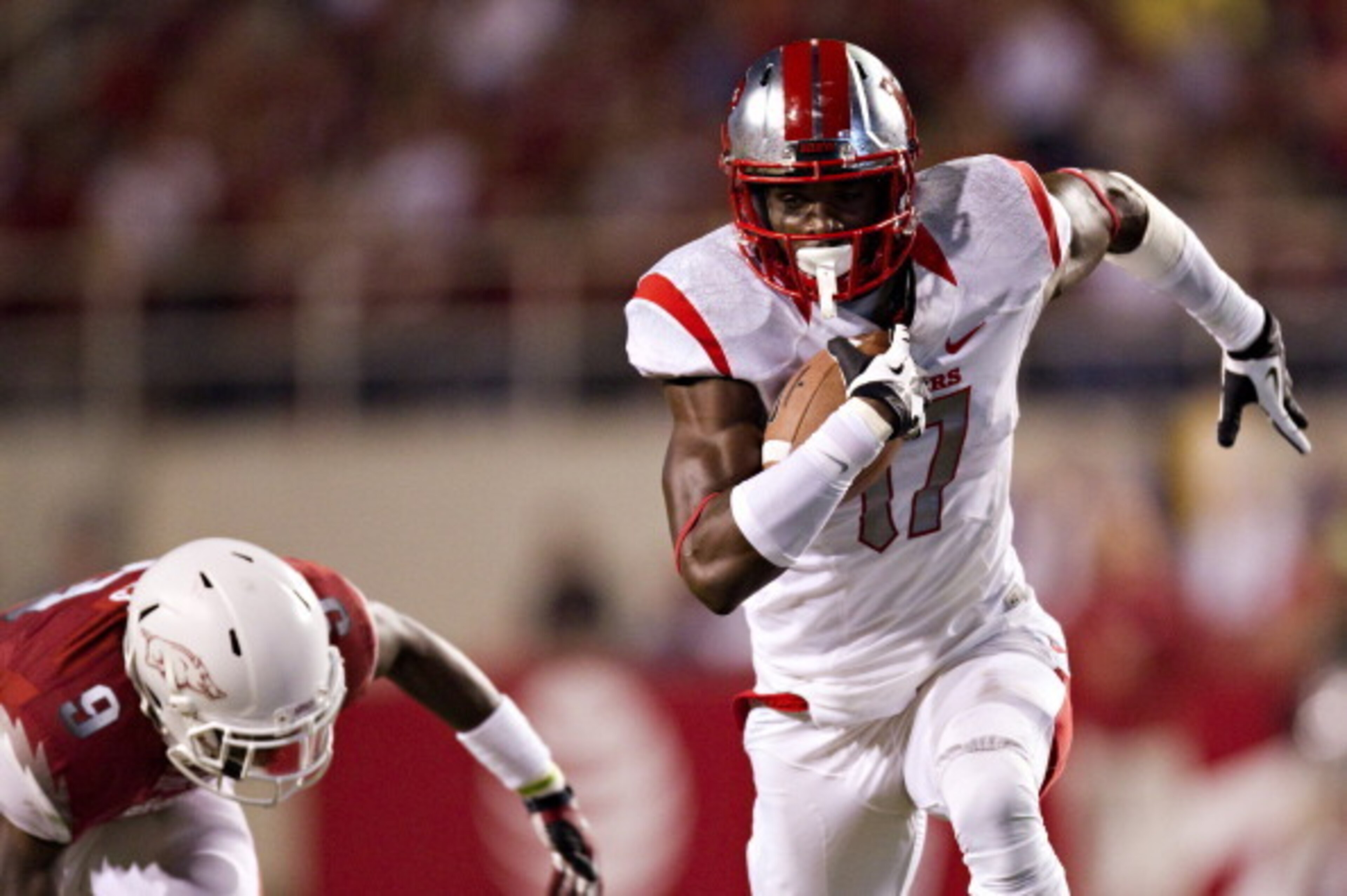 Rutgers WR Brandon Coleman (right) could add size to the Dolphins' receiving corps. Rutgers WR Brandon Coleman (right) could add size to the Dolphins' receiving corps.