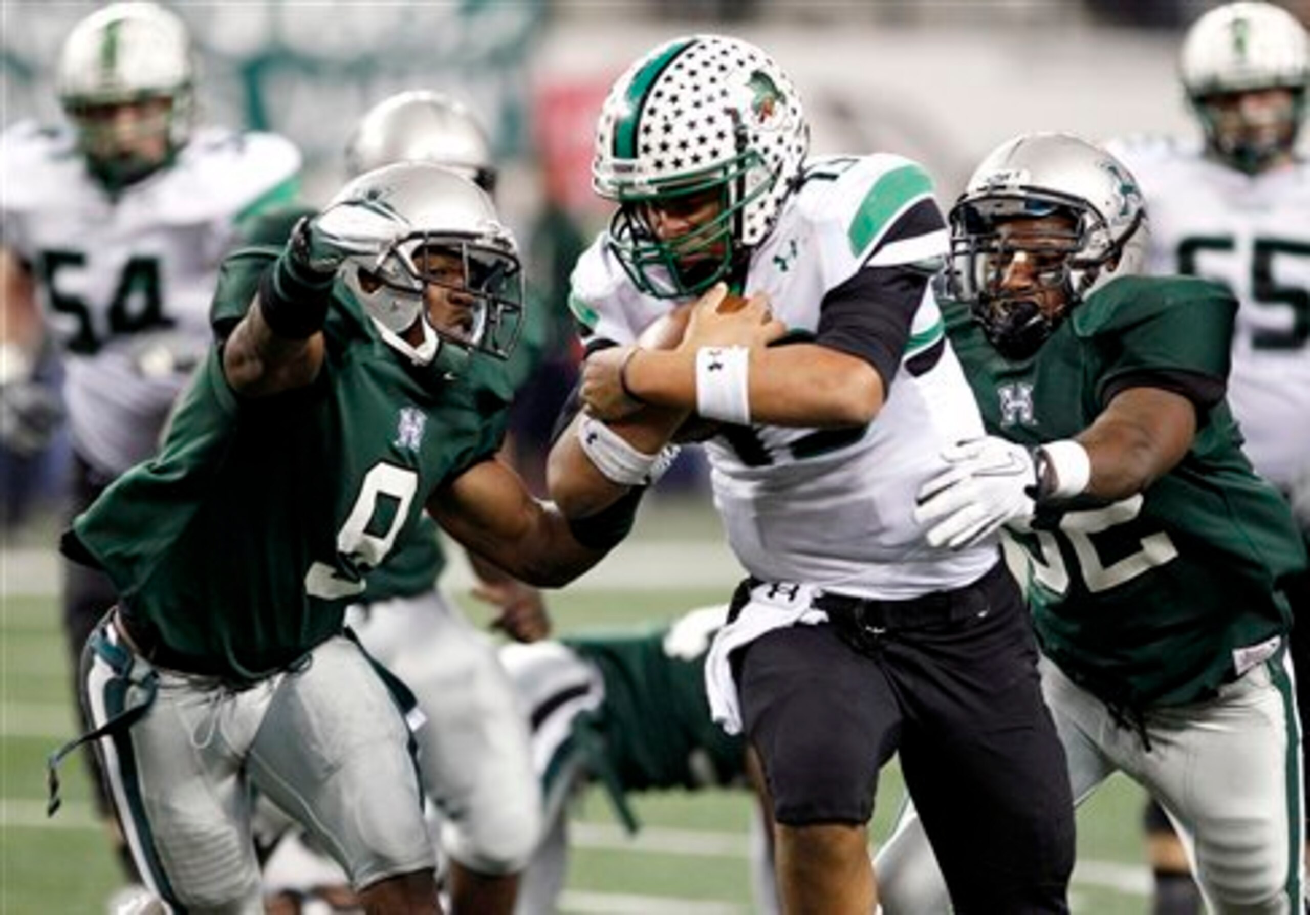 Kenny Hill runs the ball for Southlake Carroll High School