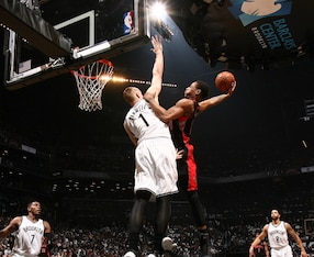 DeMar DeRozan tries to take on Mason Plumlee during Game 3.