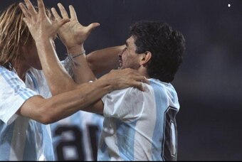 8 Jun-8 Jul 1990:  Claudio Cannigia (left) and Diego Maradona (right) both of Argentina celebrate during a match at the World Cup in Italy. \ Mandatory Credit: Billy  Stickland/Allsport