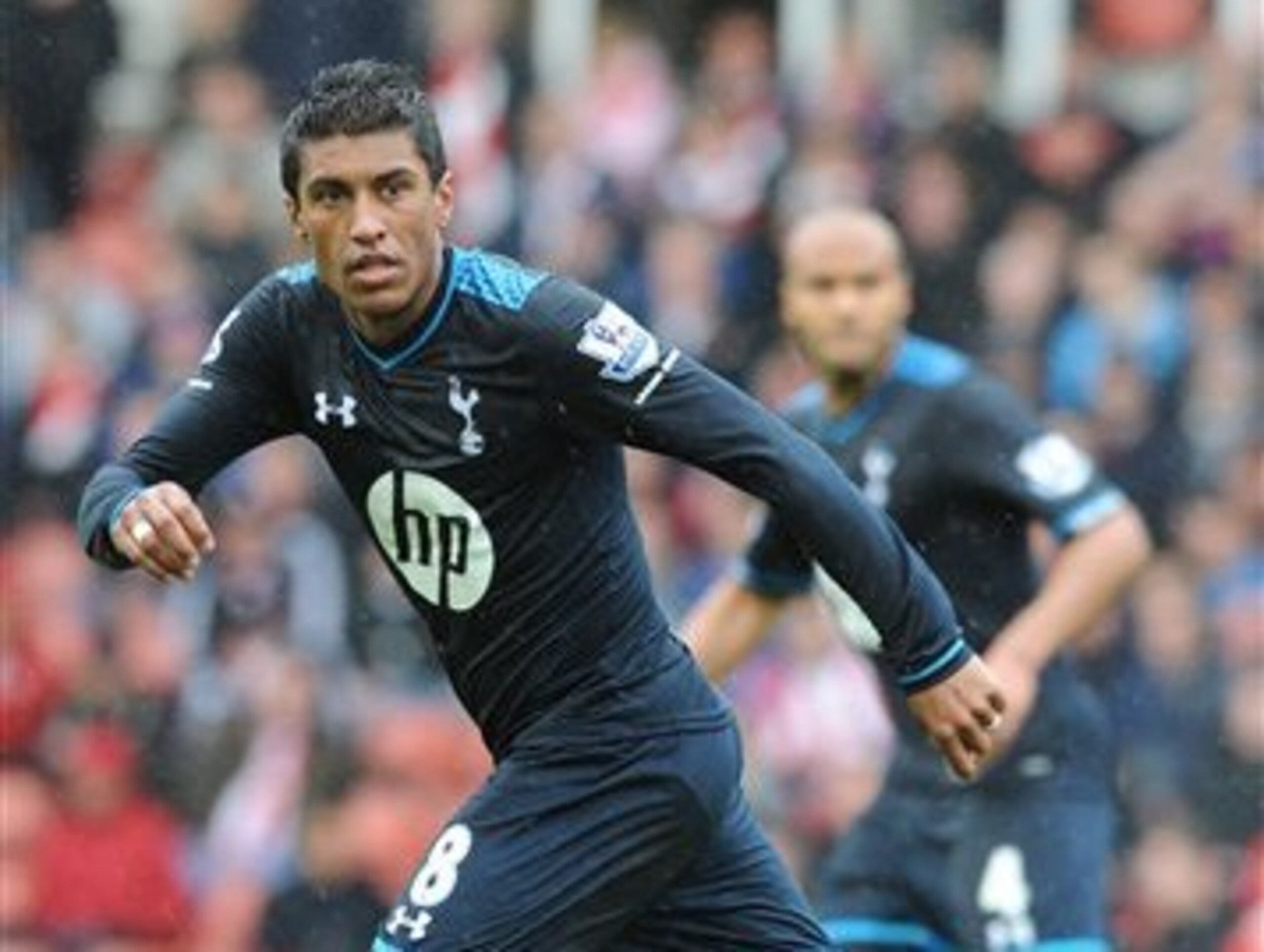 Paulinho watches on during Spurs' win over Stoke.