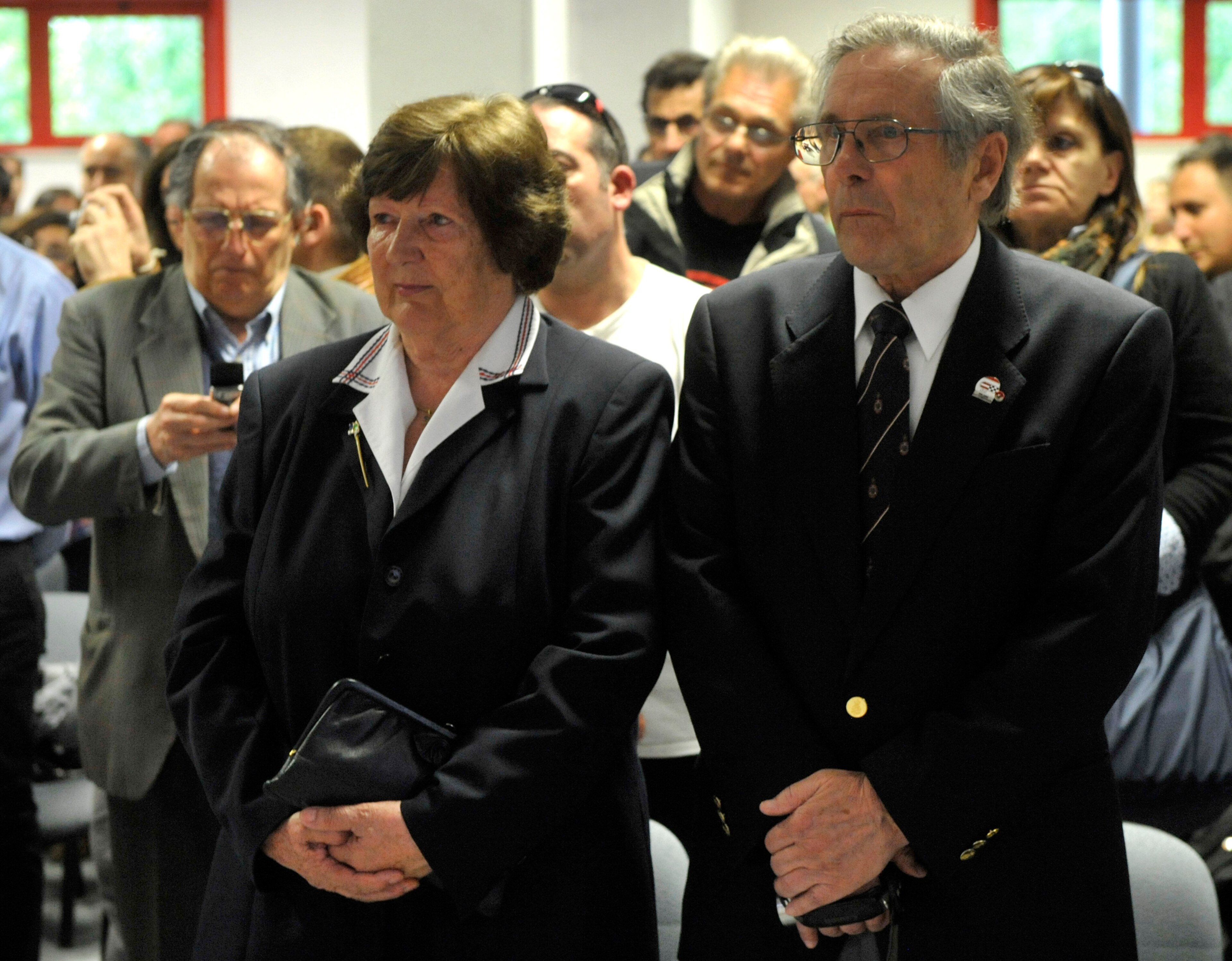 Ratzenberger's parents at the service on Wednesday.