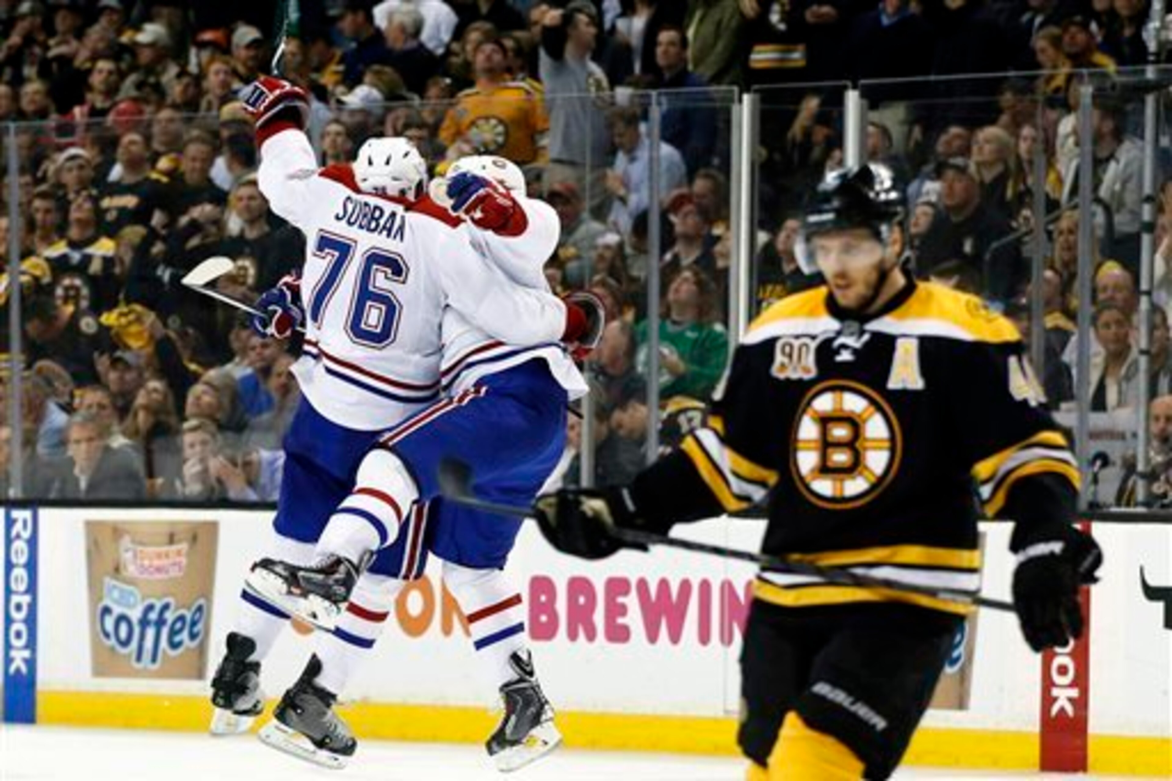 Montreal Canadiens defensemen P.K. Subban and Francis Bouillon celebrate a goal against the Boston Bruins. Montreal Canadiens defensemen P.K. Subban and Francis Bouillon celebrate a goal against the Boston Bruins.