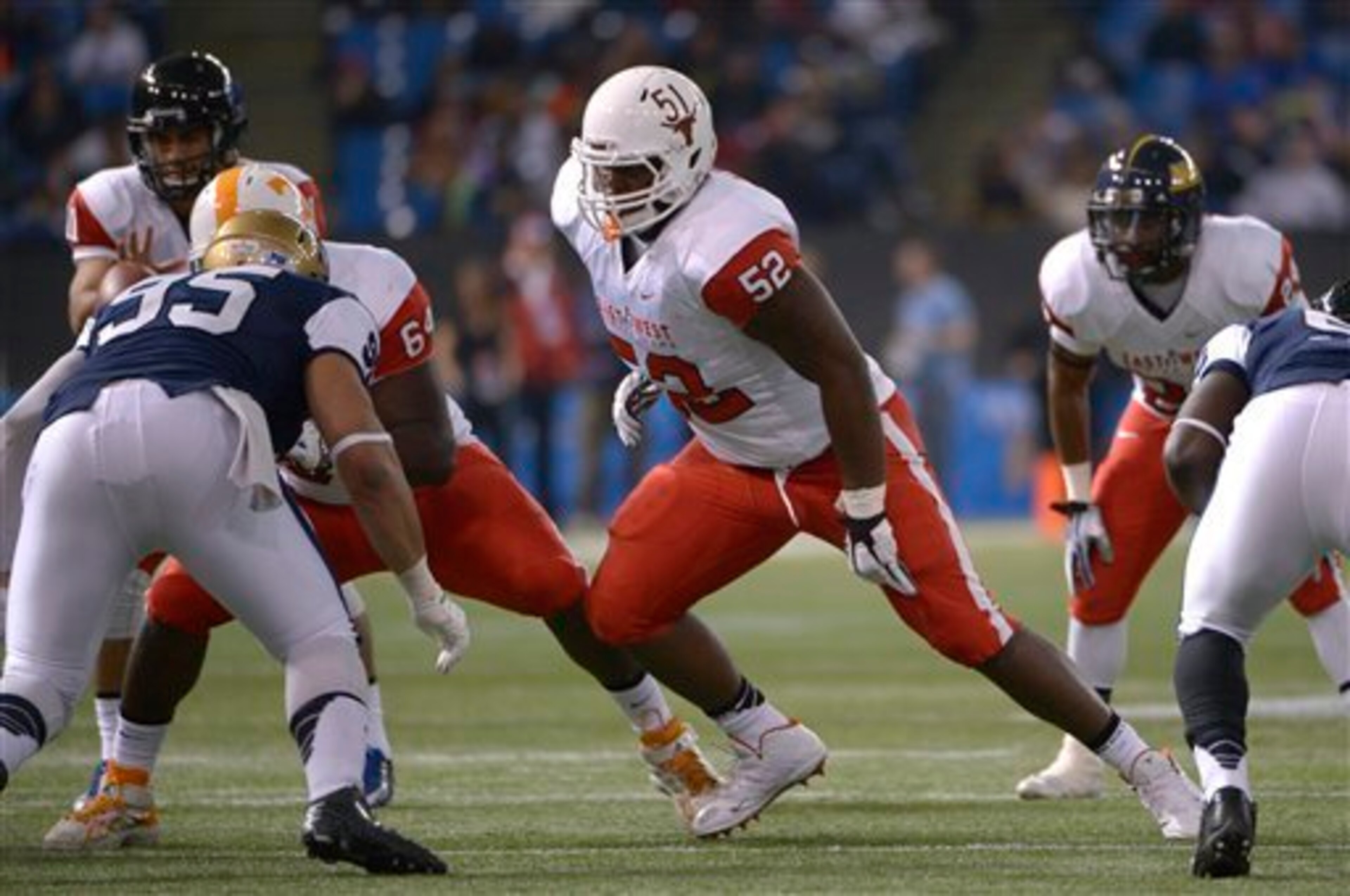 Expected to switch over to guard, Donald Hawkins is steadily climbing up draft boards.