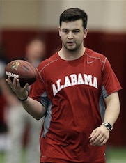 NFL officials have seen AJ McCarron's trademark football spin during his numerous draft workouts.