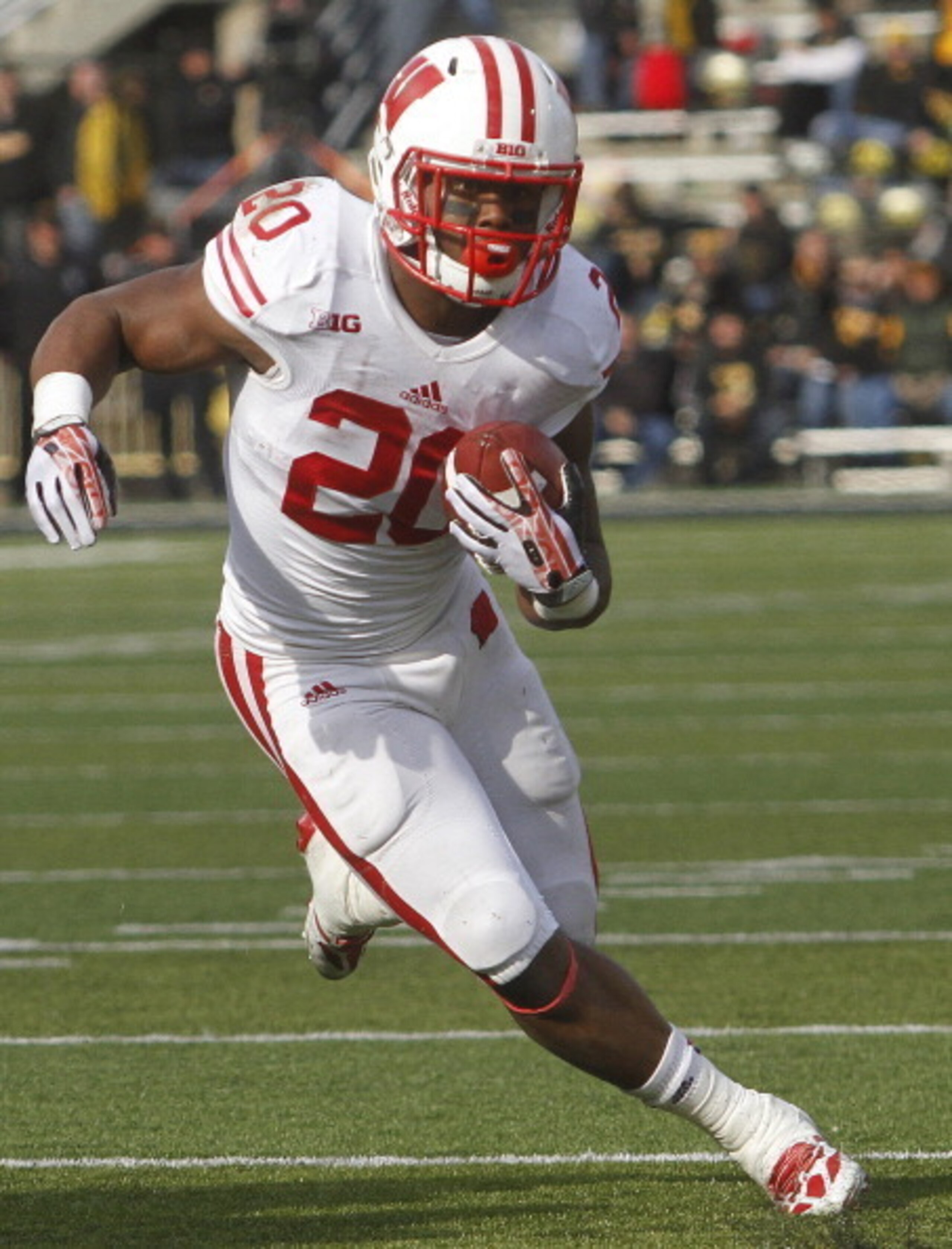 IOWA CITY, IOWA - NOVEMBER 2:  Running back James White #20 of the Wisconsin Badgers runs up field during the fourth quarter against the Iowa Hawkeyes on November 2, 2013 at Kinnick Stadium in Iowa City, Iowa. Wisconsin won 28-9.(Photo by Matthew Holst/Ge