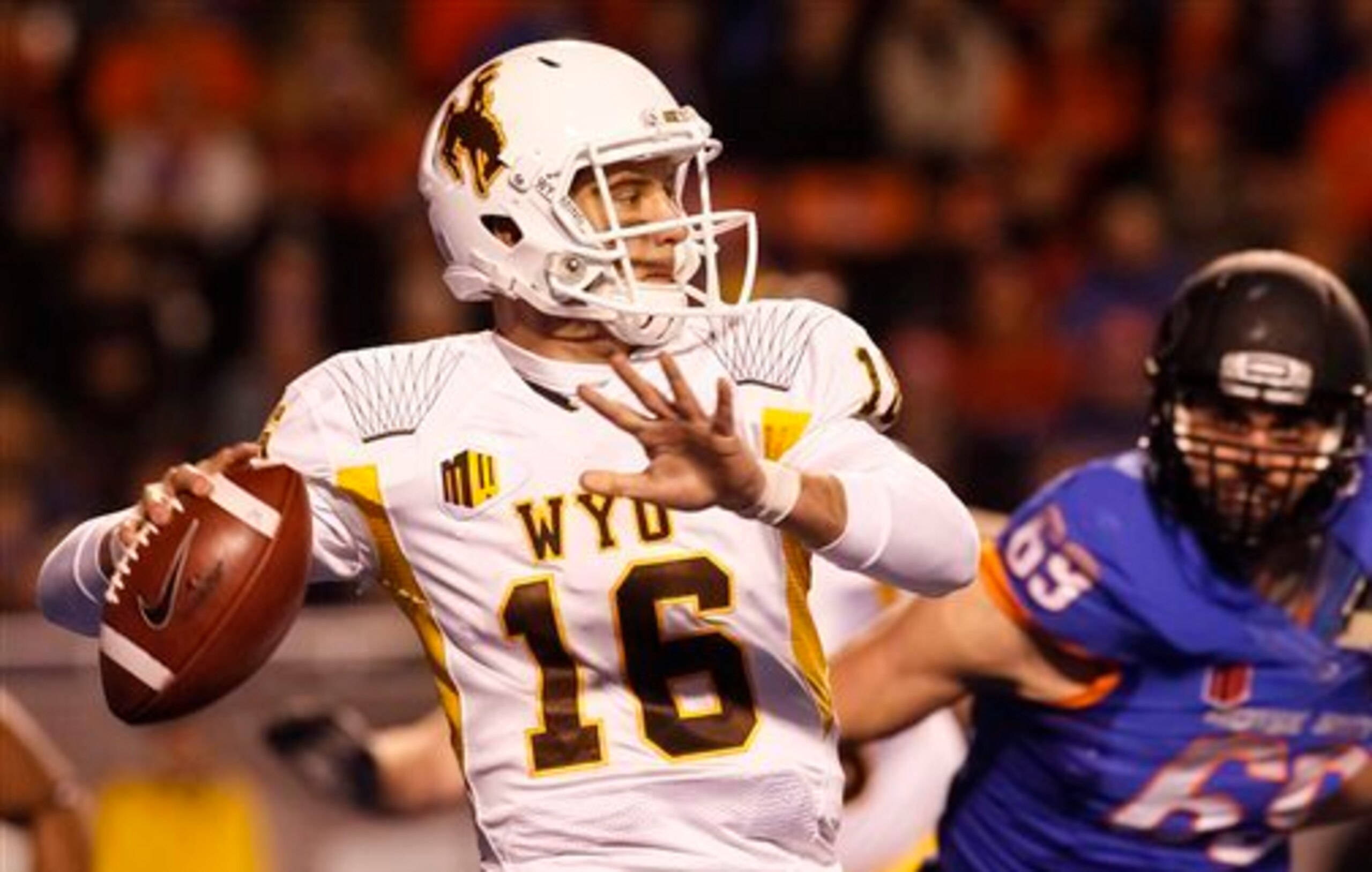 Wyoming's Brett Smith threw his hat into a crowded quarterback draft class.
