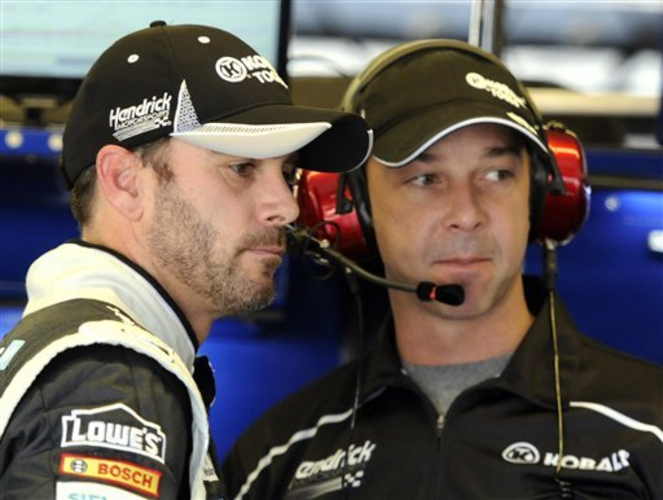 Jimmie Johnson (l) with crew chief Chad Knaus