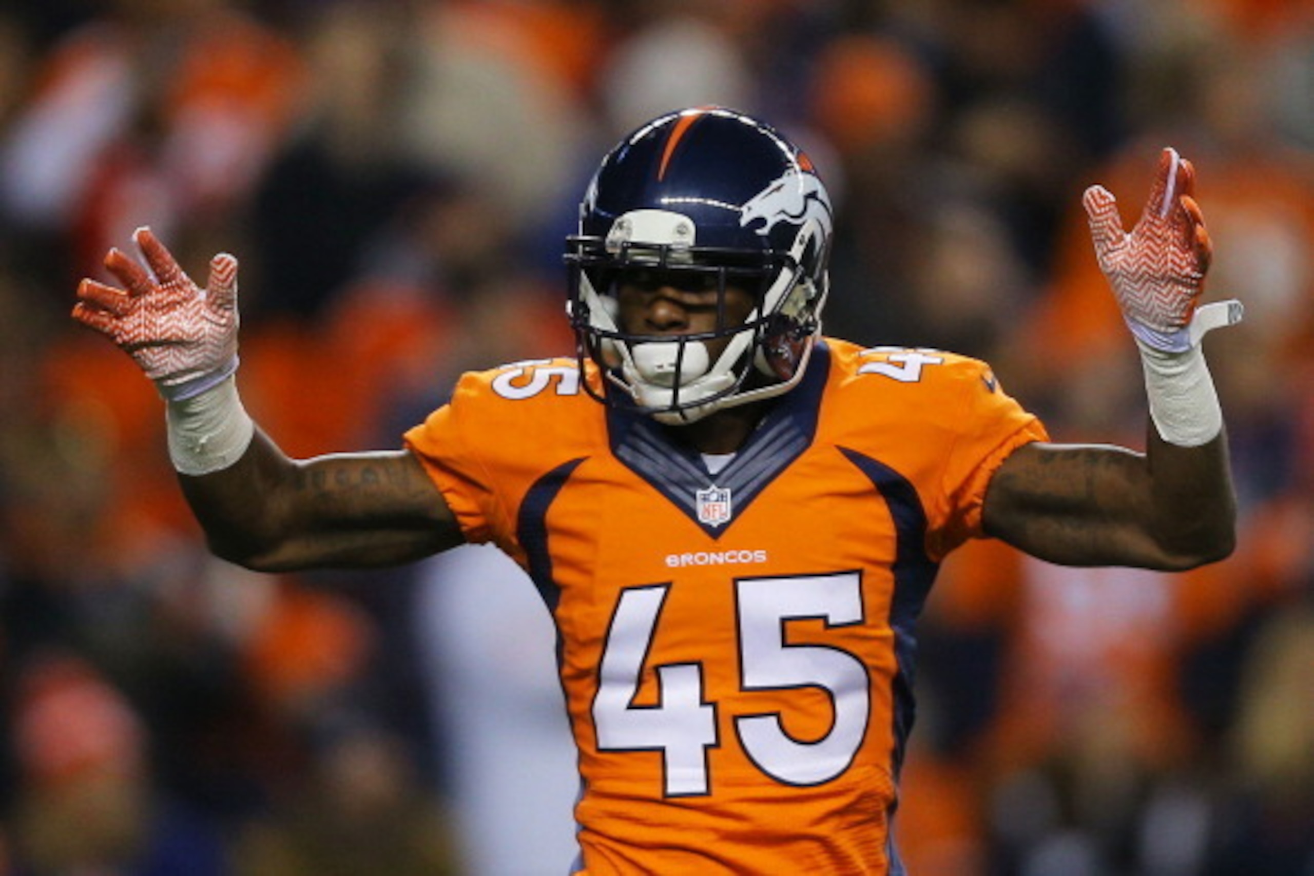 DENVER, CO - NOVEMBER 17:   Dominique Rodgers-Cromartie #45 of the Denver Broncos celebrates in the first quarter against the Kansas City Chiefs at Sports Authority Field at Mile High on November 17, 2013 in Denver, Colorado.  (Photo by Justin Edmonds/Get