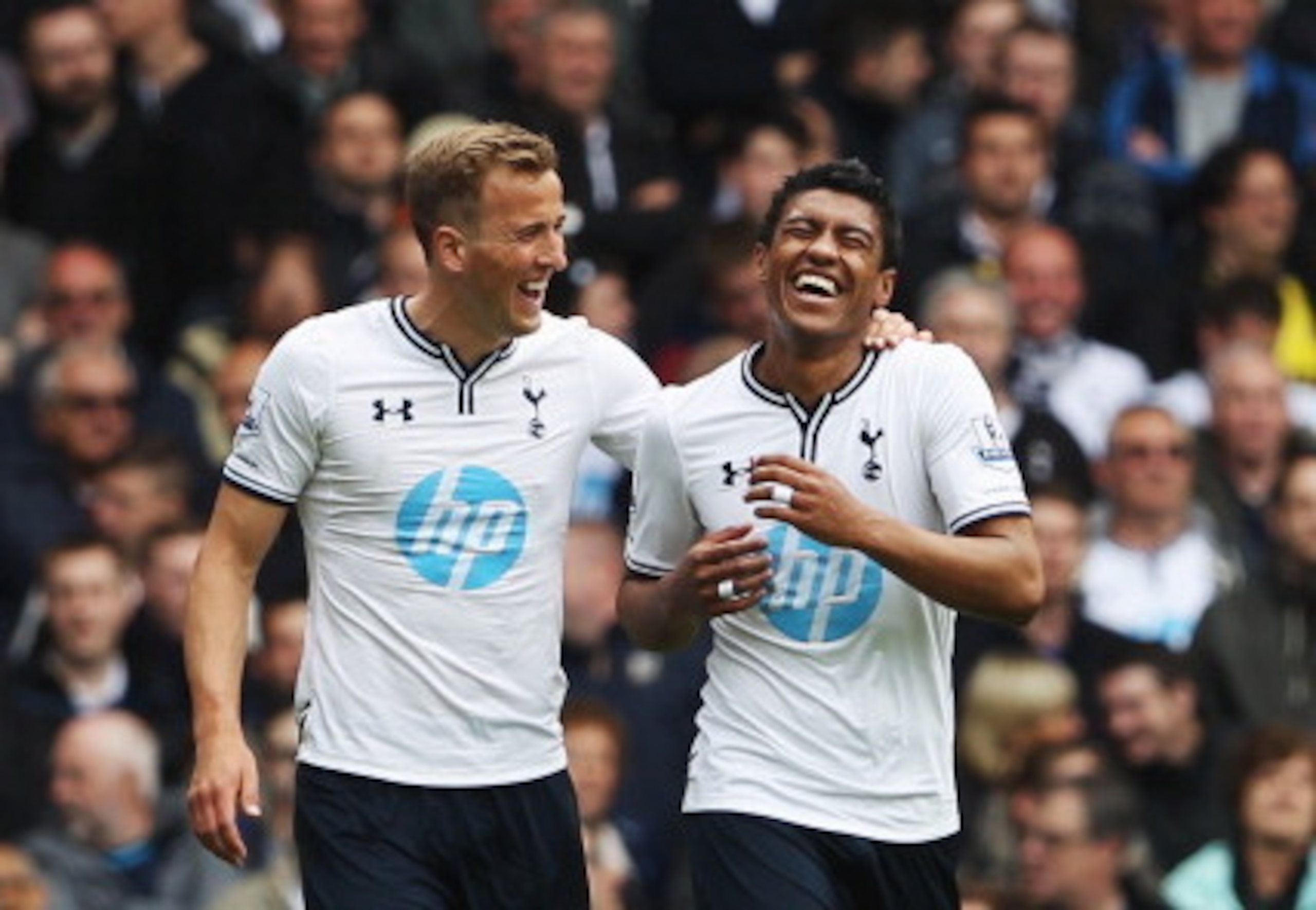 Harry Kane shares a laugh with Paulinho on an enjoyable final day.