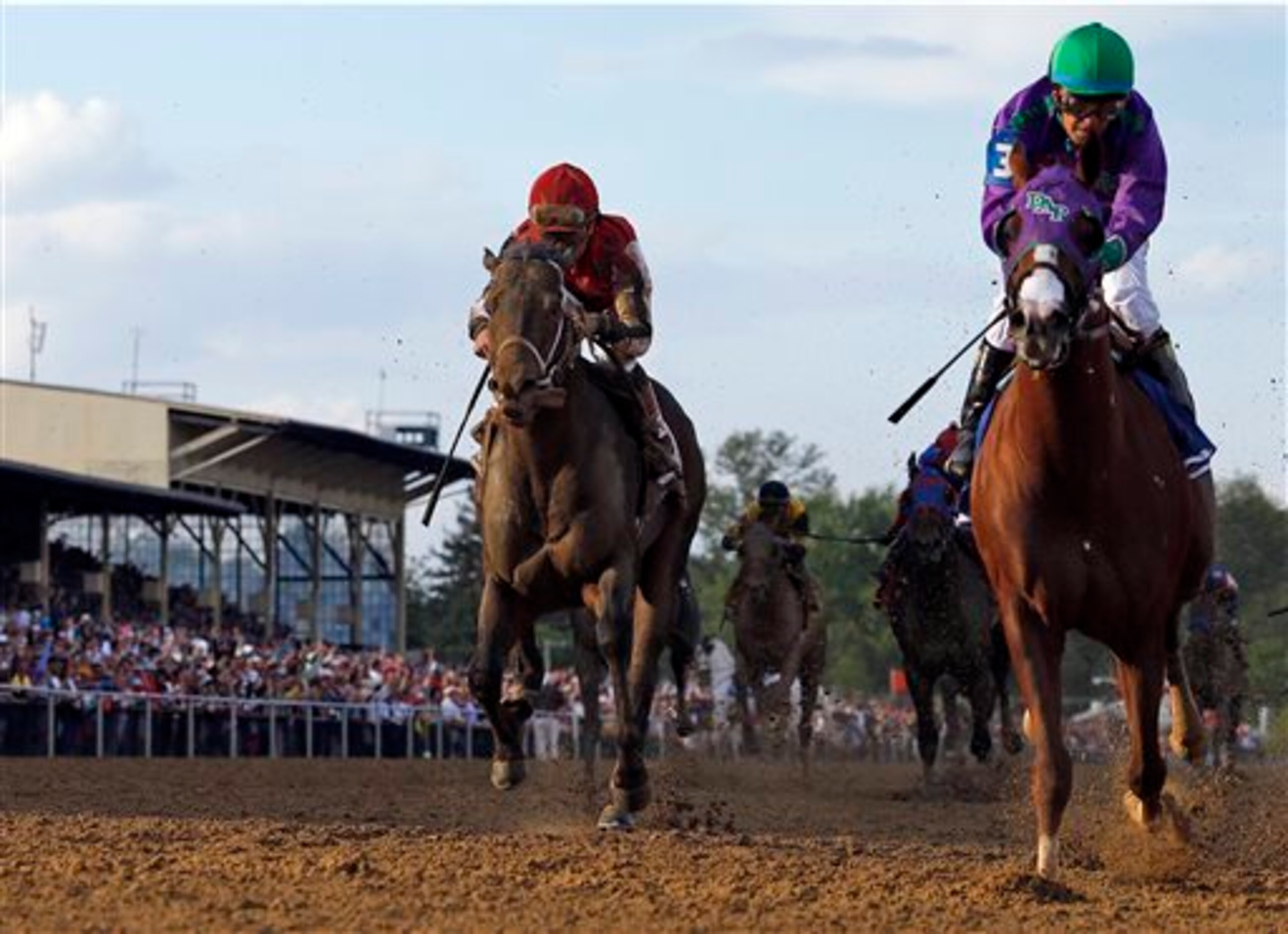 Ride On Curlin (left) finished strong under Joel Rosario.