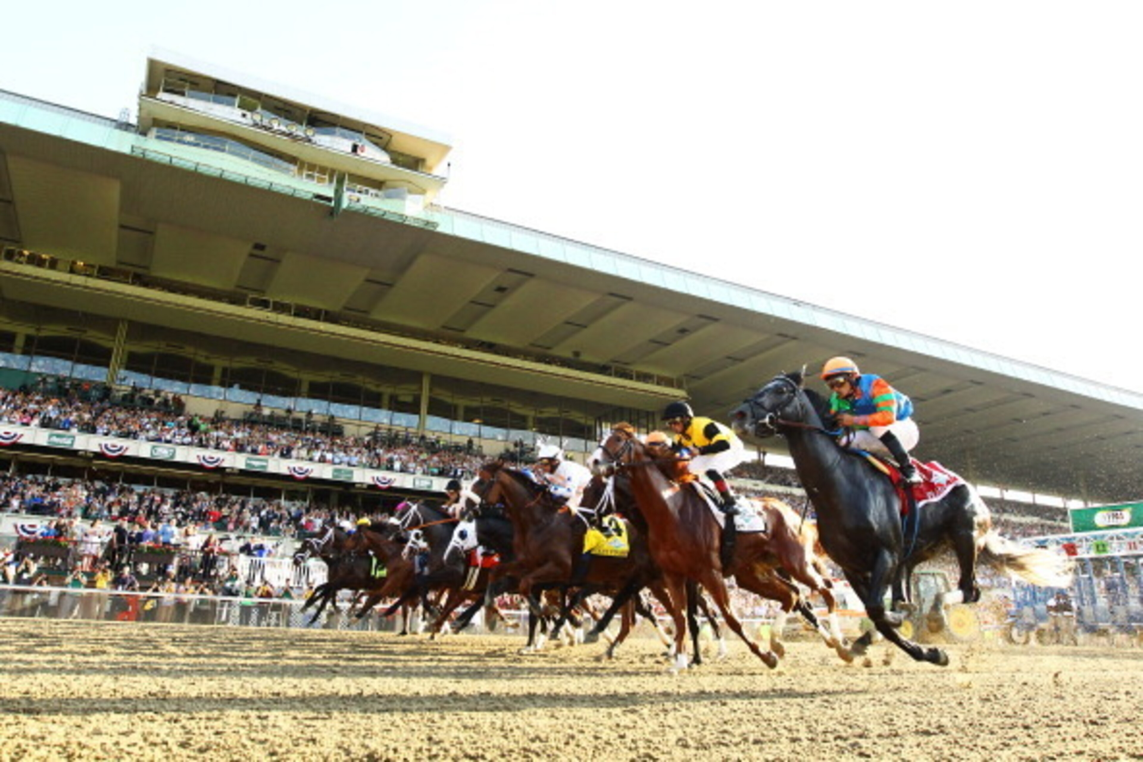 The field for the 145th Belmont Stakes breaks from the gate.