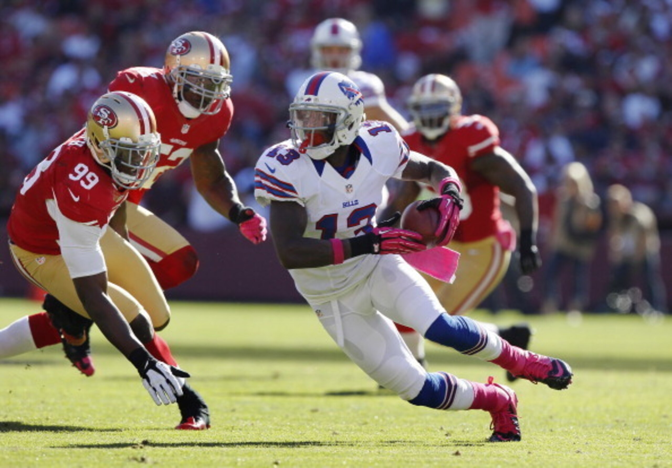 Niners linebackers Aldon Smith (No. 99) and Patrick Willis (No. 52) are encouraged by not having to chase down the ever-elusive Stevie Johnson anymore.