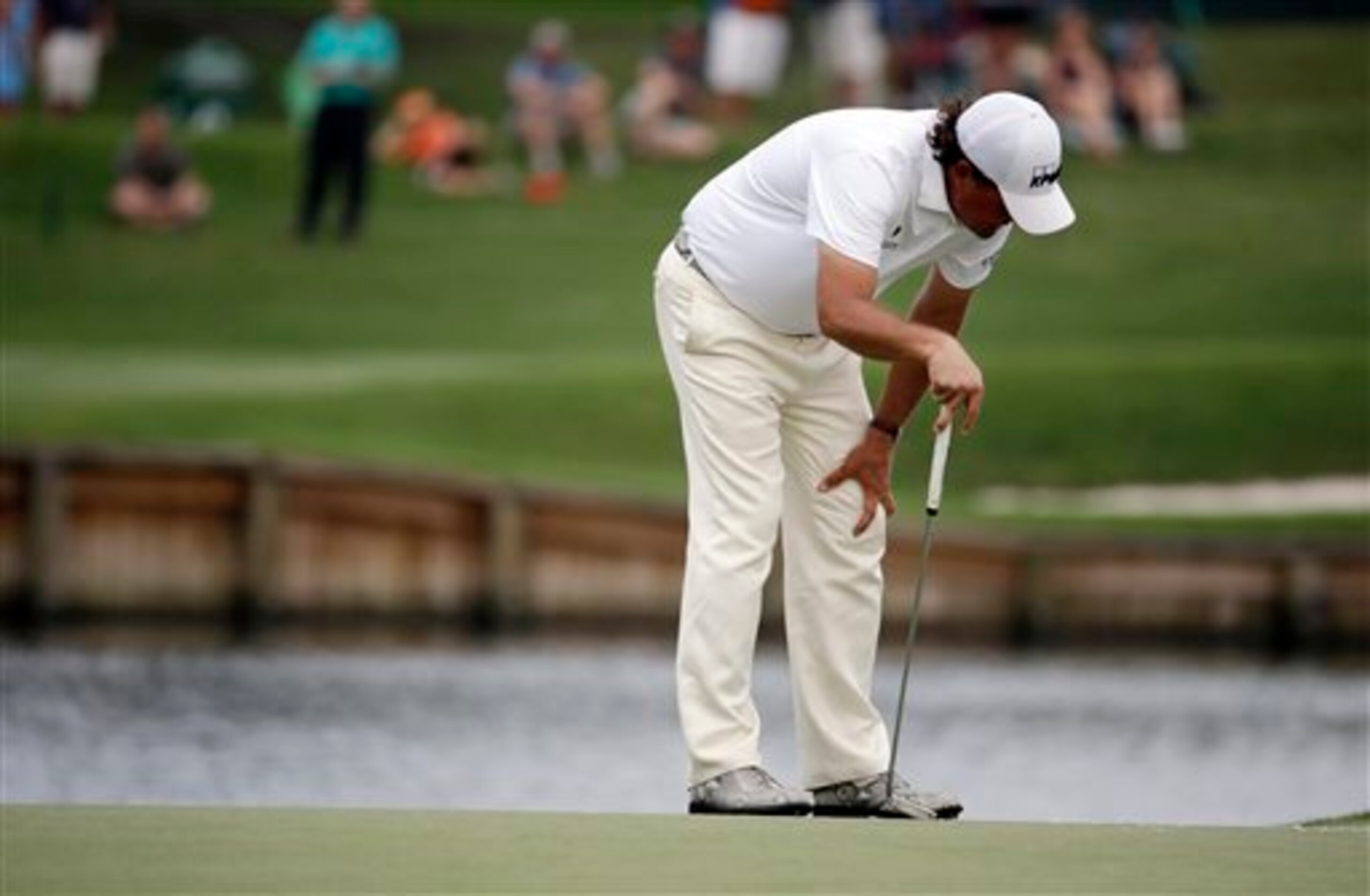 This pose has been struck too many times by Phil Mickelson this year.