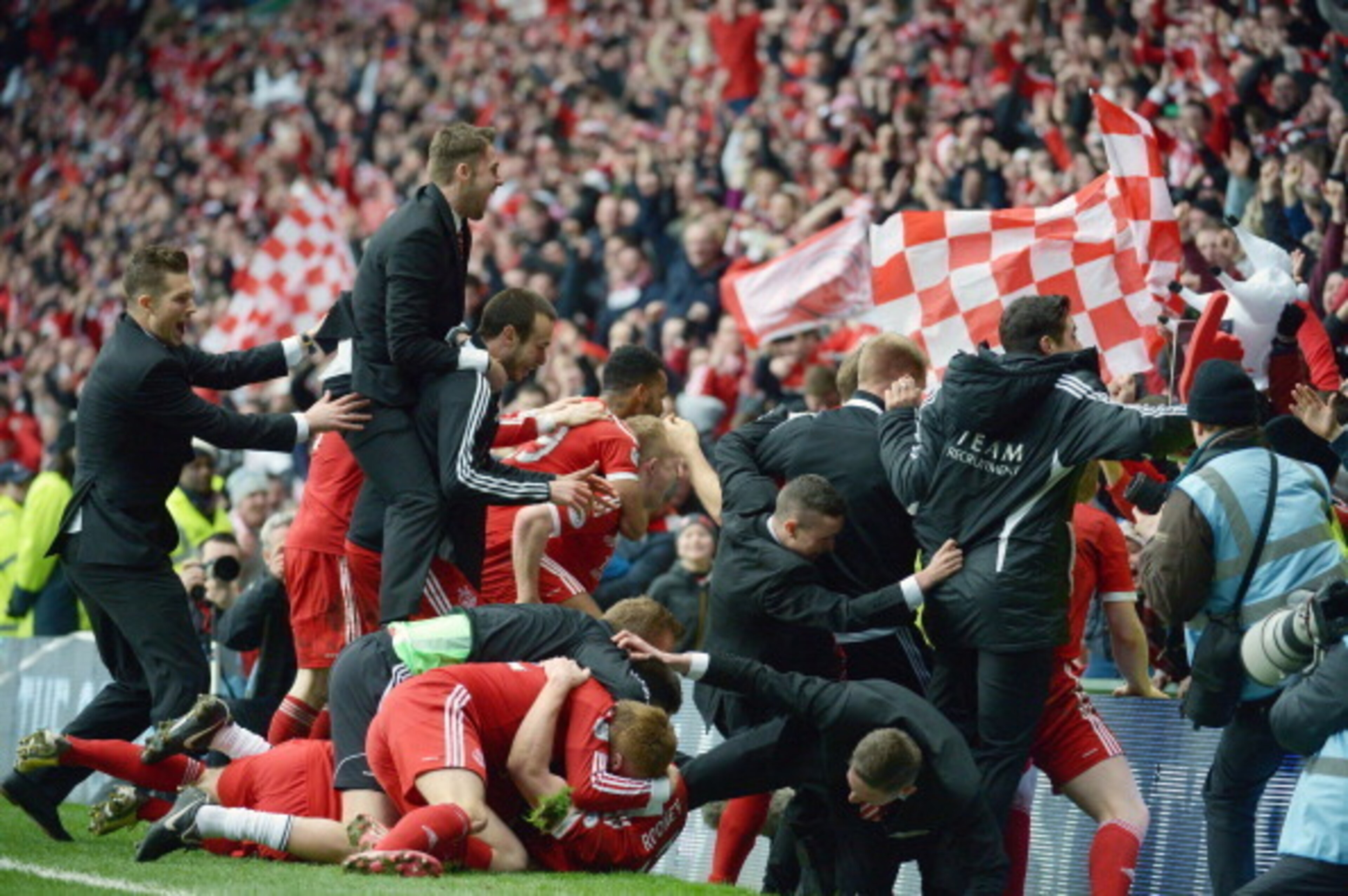 Revitalised: Aberdeen players are euphoric after winning the club's first trophy in 19 years.
