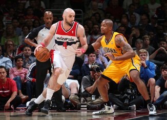 WASHINGTON, DC - MAY 11: Marcin Gortat #4 of the Washington Wizards handles the ball against the Indiana Pacers in Game Four of the Eastern Conference Semifinals against the Indiana Pacers at Verizon Center on May 11, 2014 in Washington, DC. NOTE TO USER: