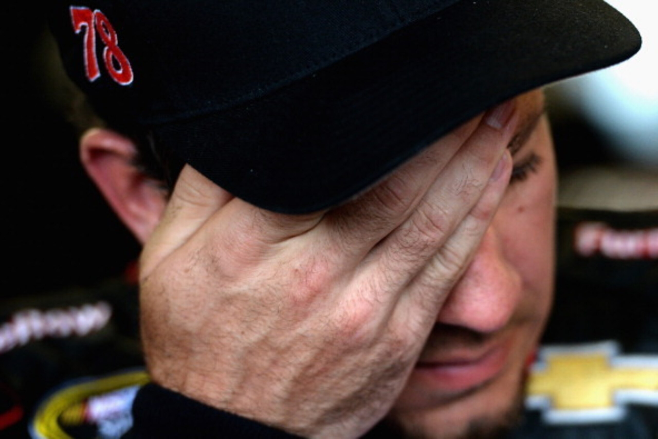 Martin Truex Jr. doesn't have to say a word; his expression tells the story of how disappointing of a season it has been for him thus far in 2014.