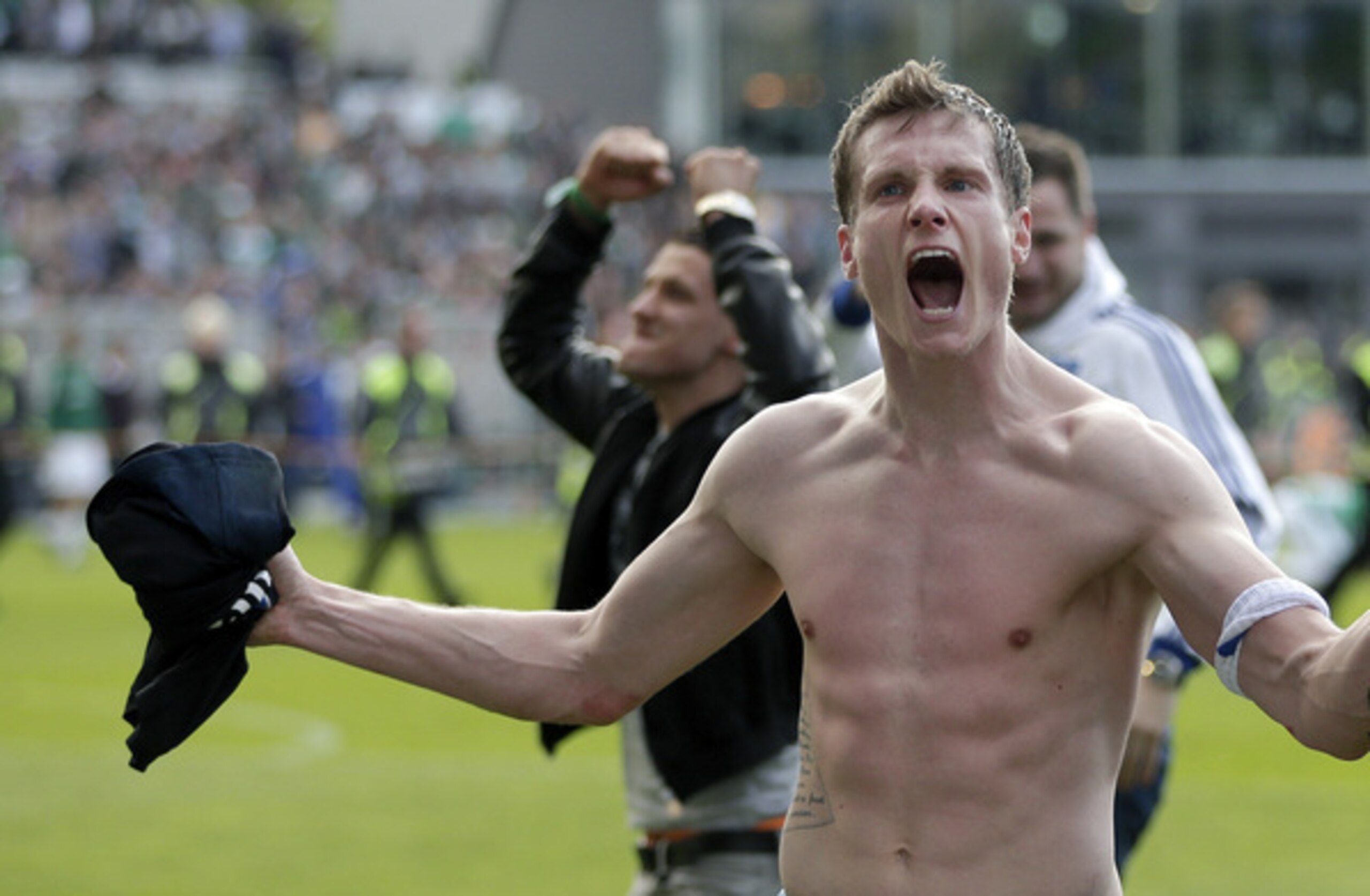 The incredible Jansen celebrates surviving relegation.