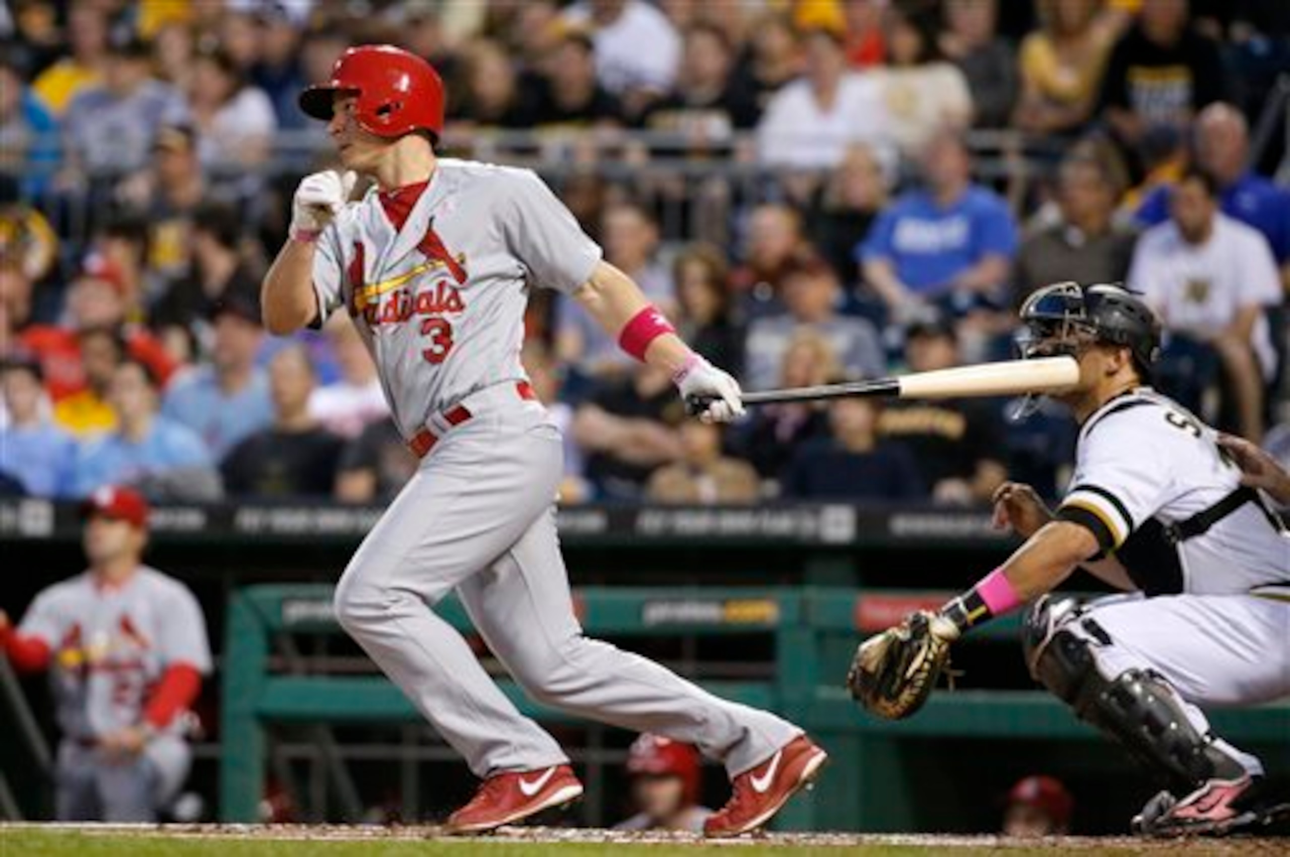 Cardinals' infielder Mark Ellis gets a hit against the Pirates on May 12.