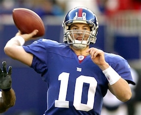 Fighting for his job, Manning threw his first career game-winning touchdown pass against a Denver Broncos team riding a five-game winning streak.