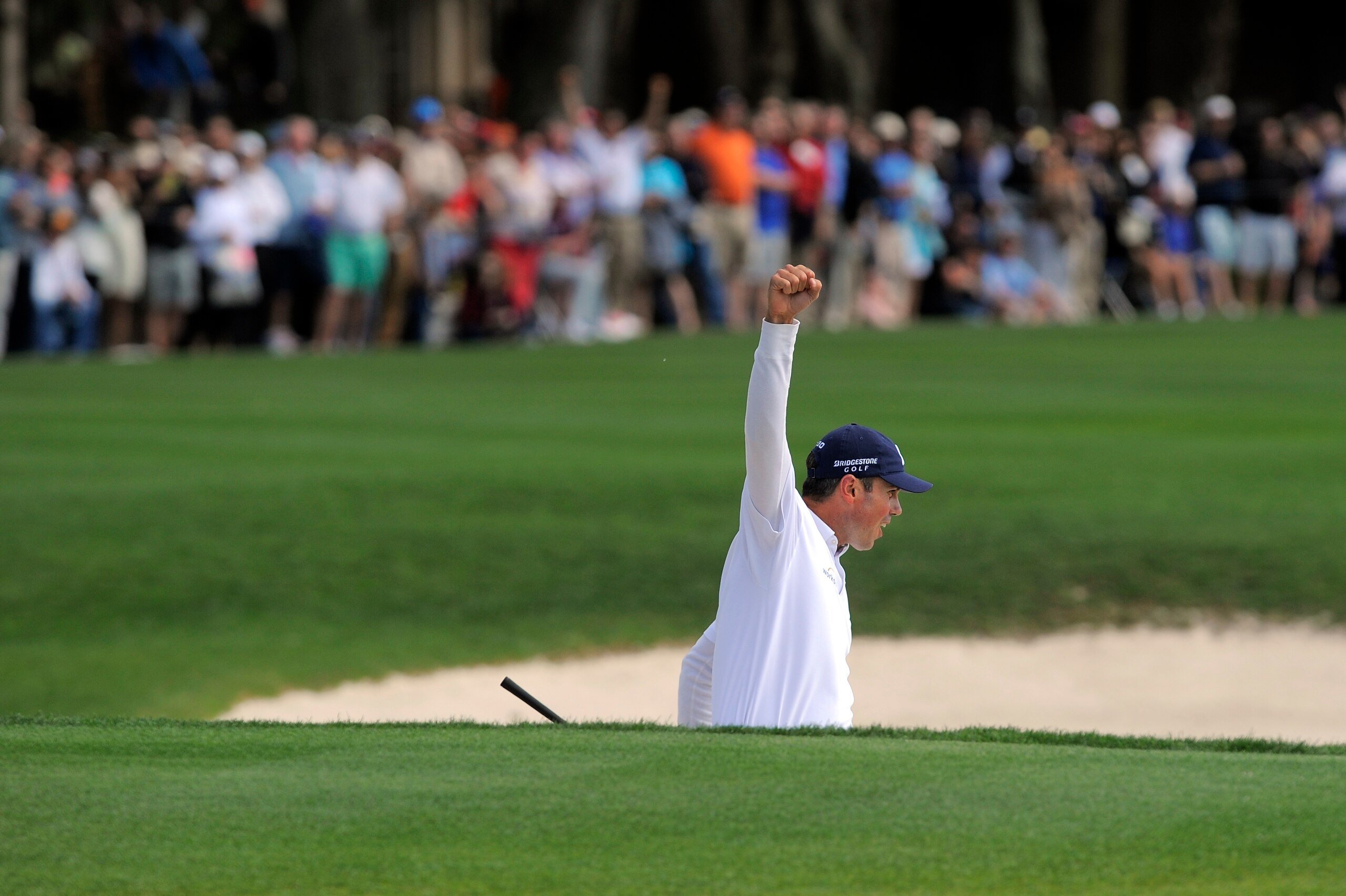 Matt Kuchar celebrates his holed bunker shot to win the RBC Heritage Classic.