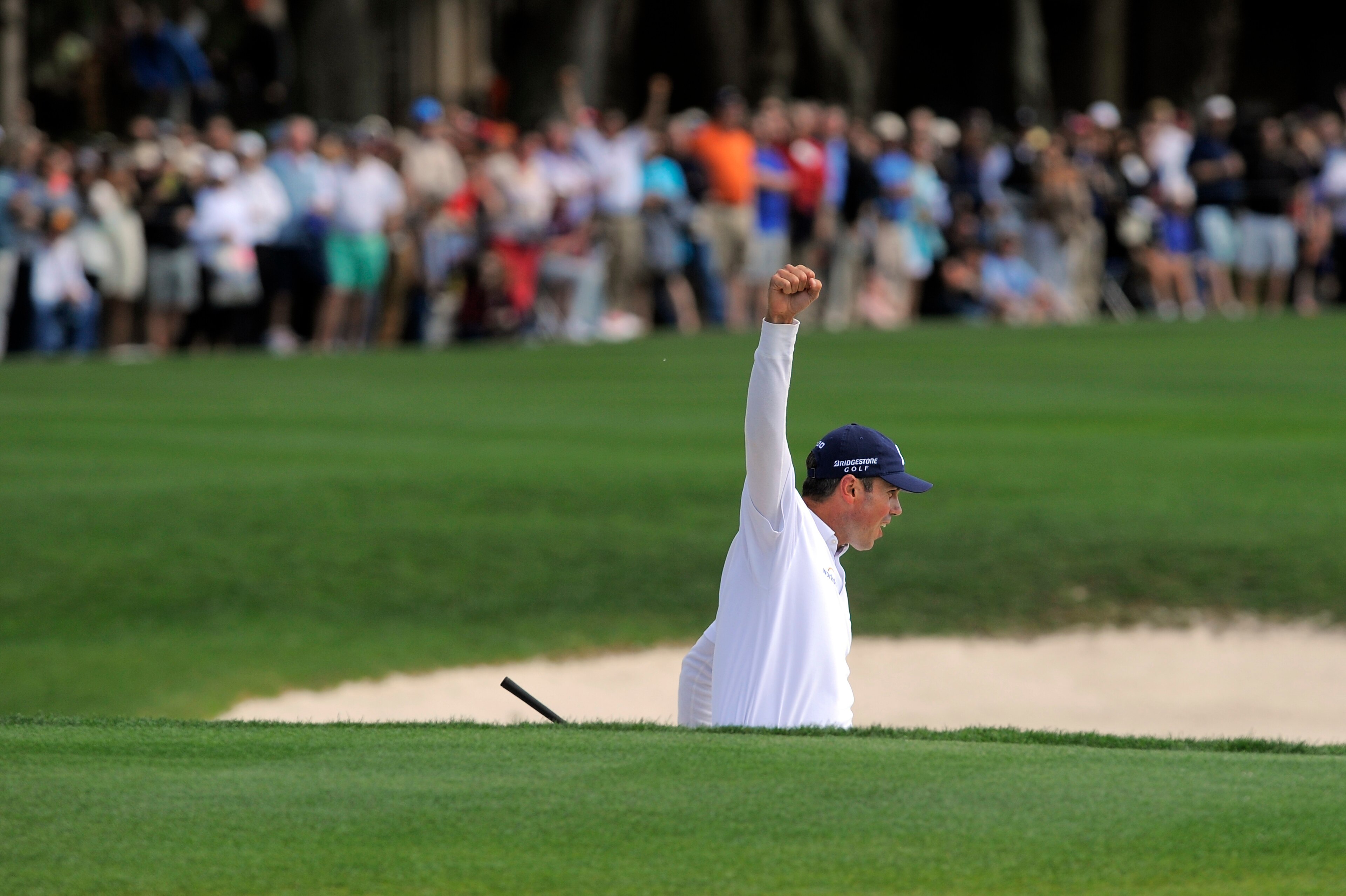 Matt Kuchar celebrates his holed bunker shot to win the RBC Heritage Classic.