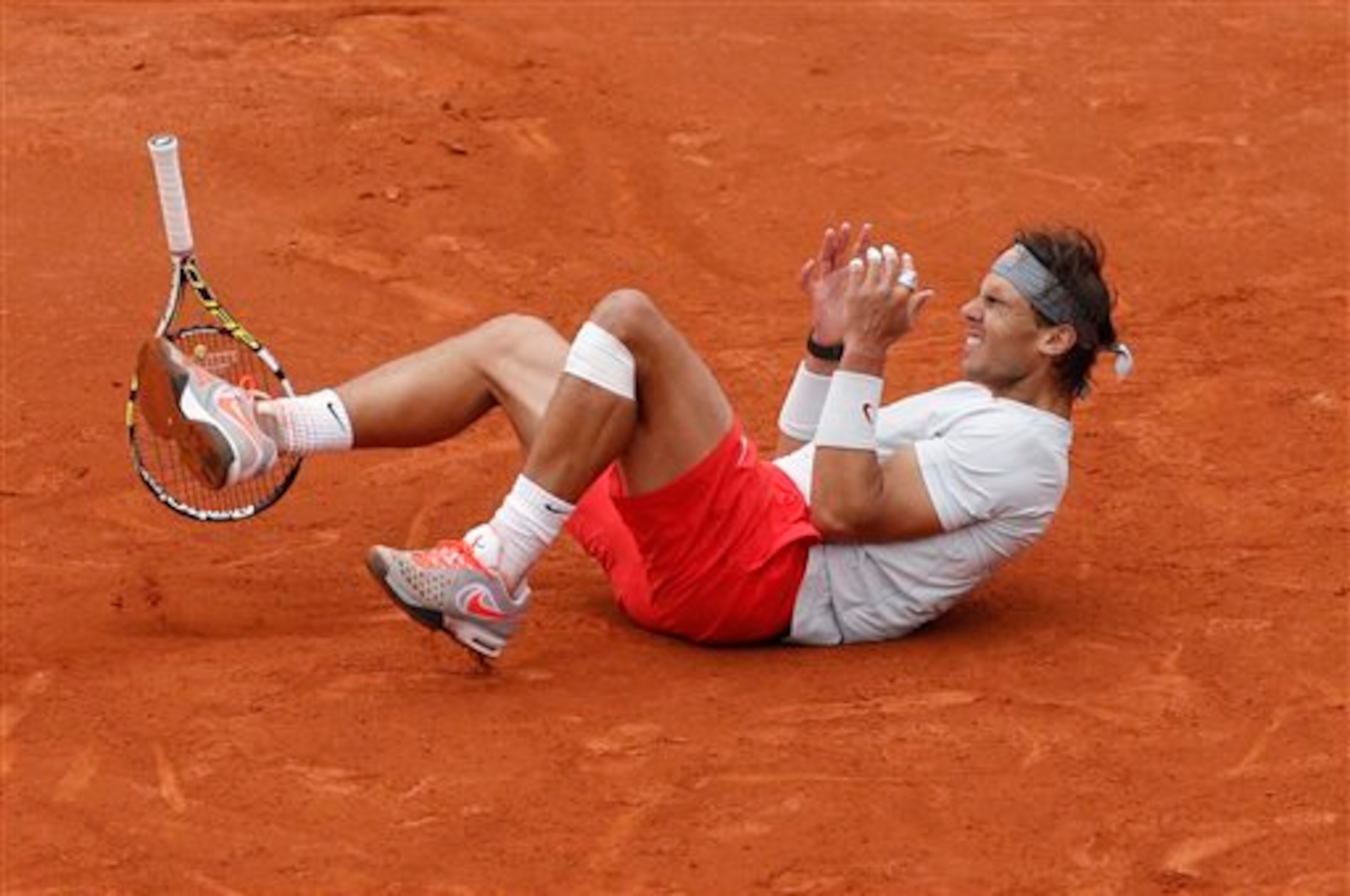 Rafael Nadal celebrates winning the 2013 French Open.