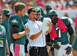 QB coach Bill Lazor with QBs Nick Foles and Michael Vick