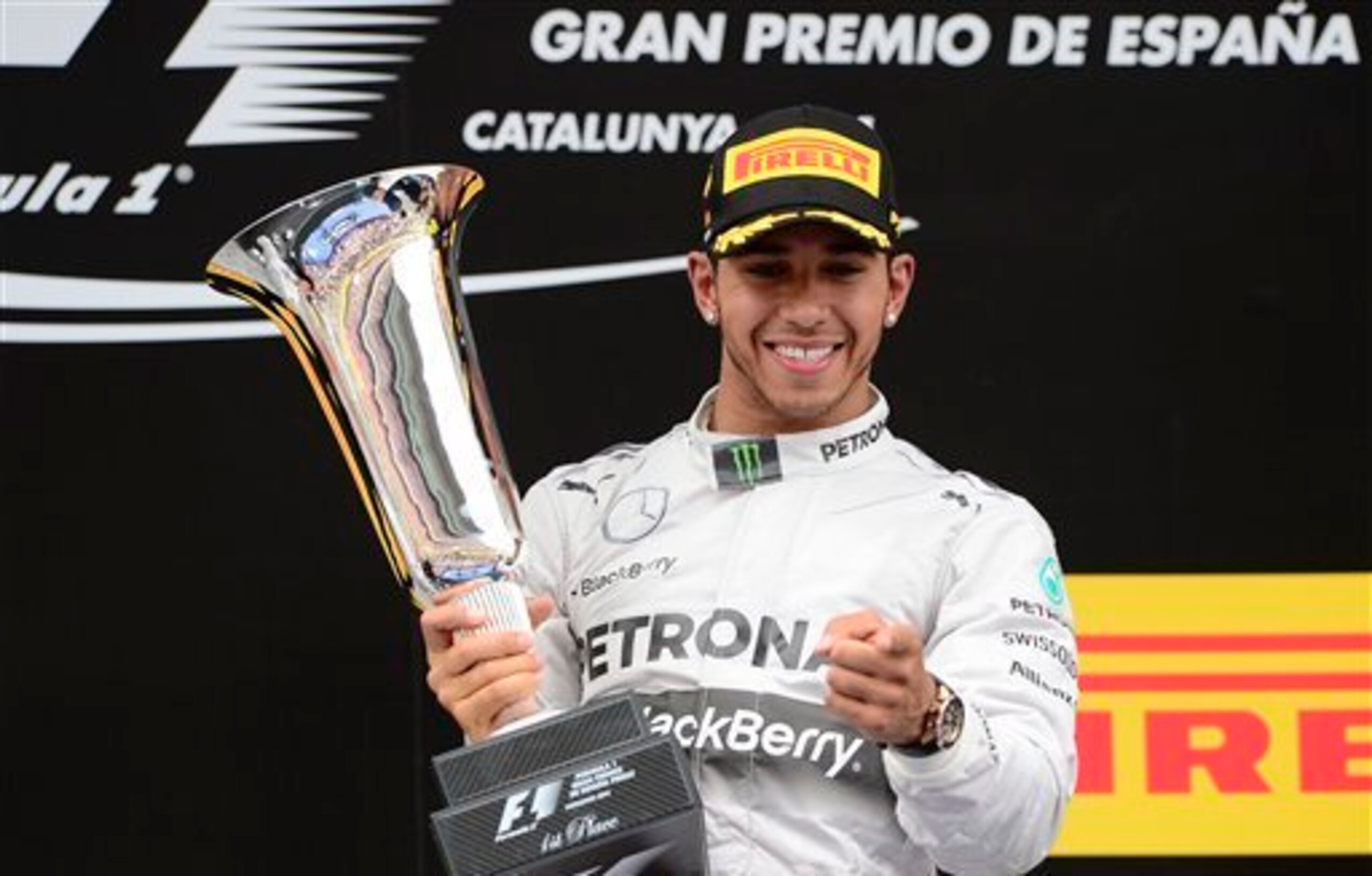Lewis Hamilton with Mercedes' prototype megaphone exhaust. Or it could be his trophy from Spain.