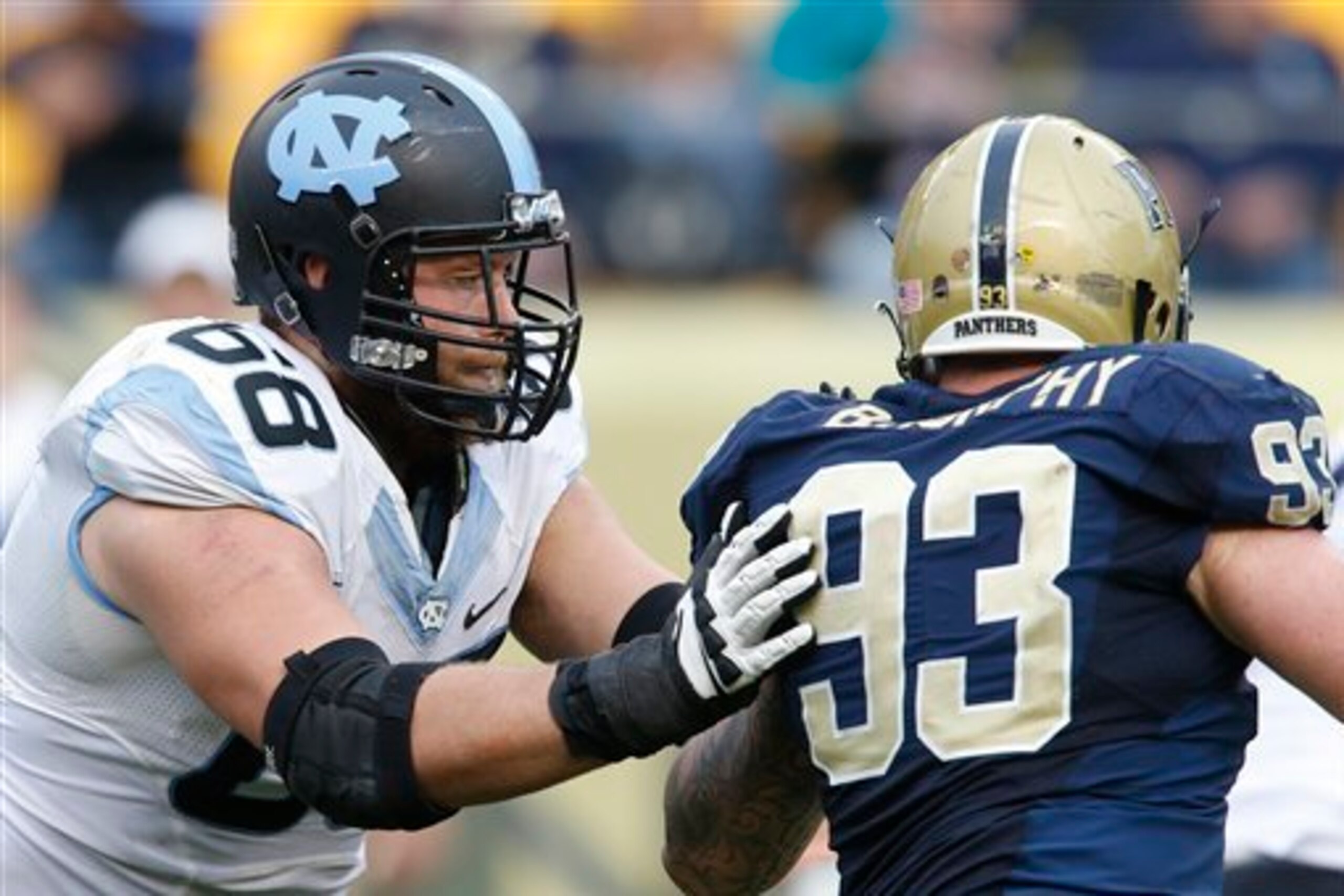 Former North Carolina offensive tackle James Hurst, now with the Baltimore Ravens, could provide immediate competition up front despite going undrafted.